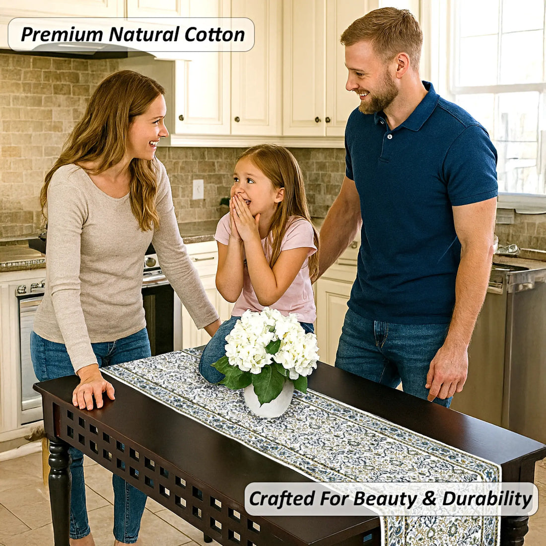 Family in a kitchen with a decorative table runner featuring white flowers.