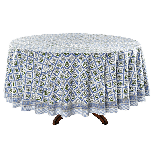Round tablecloth with blue and green pattern on a white background