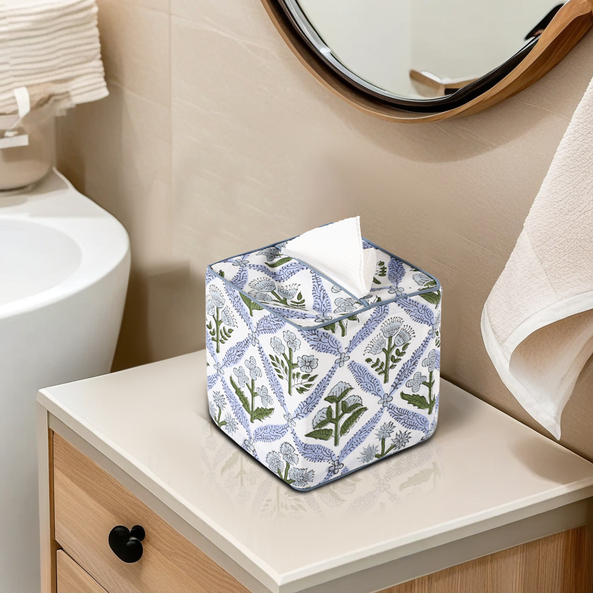 Tissue box with floral pattern on a bathroom counter