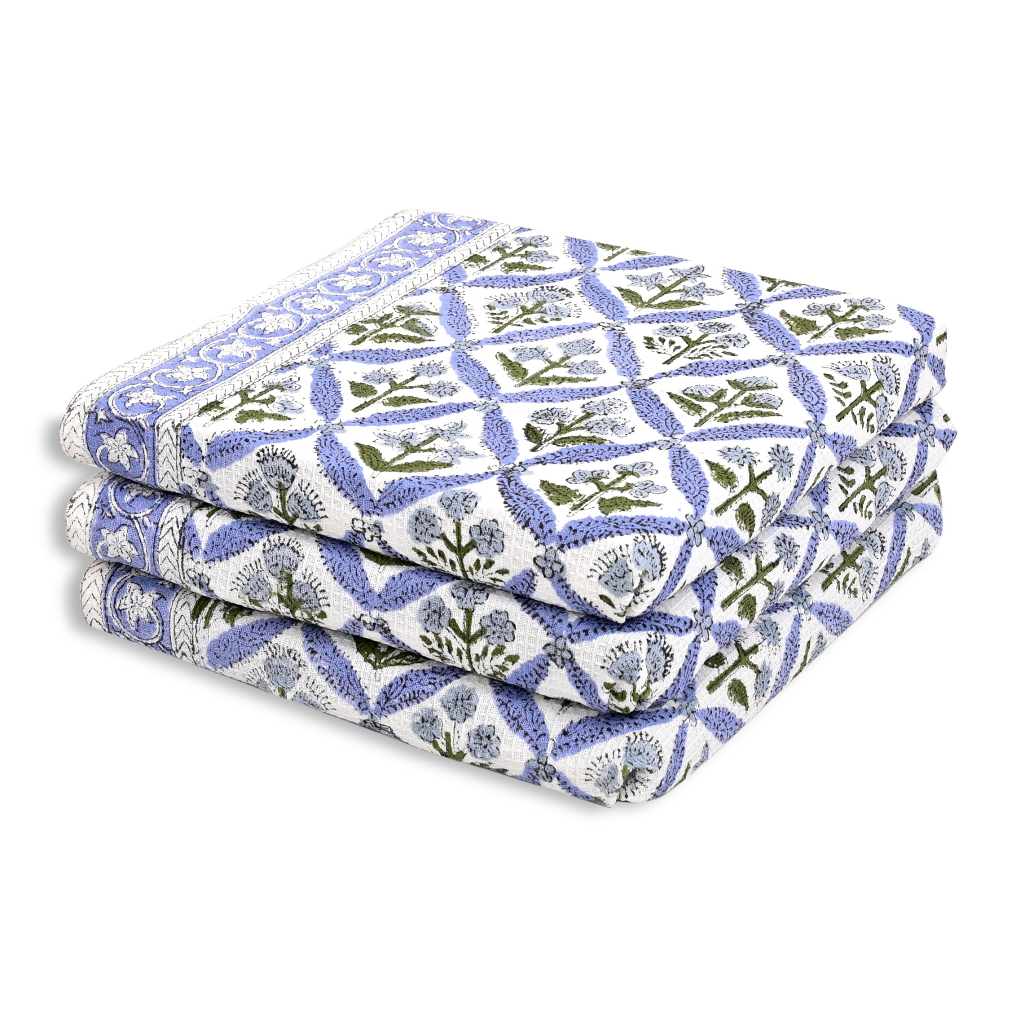 Stack of floral-patterned fabric sheets on a white background