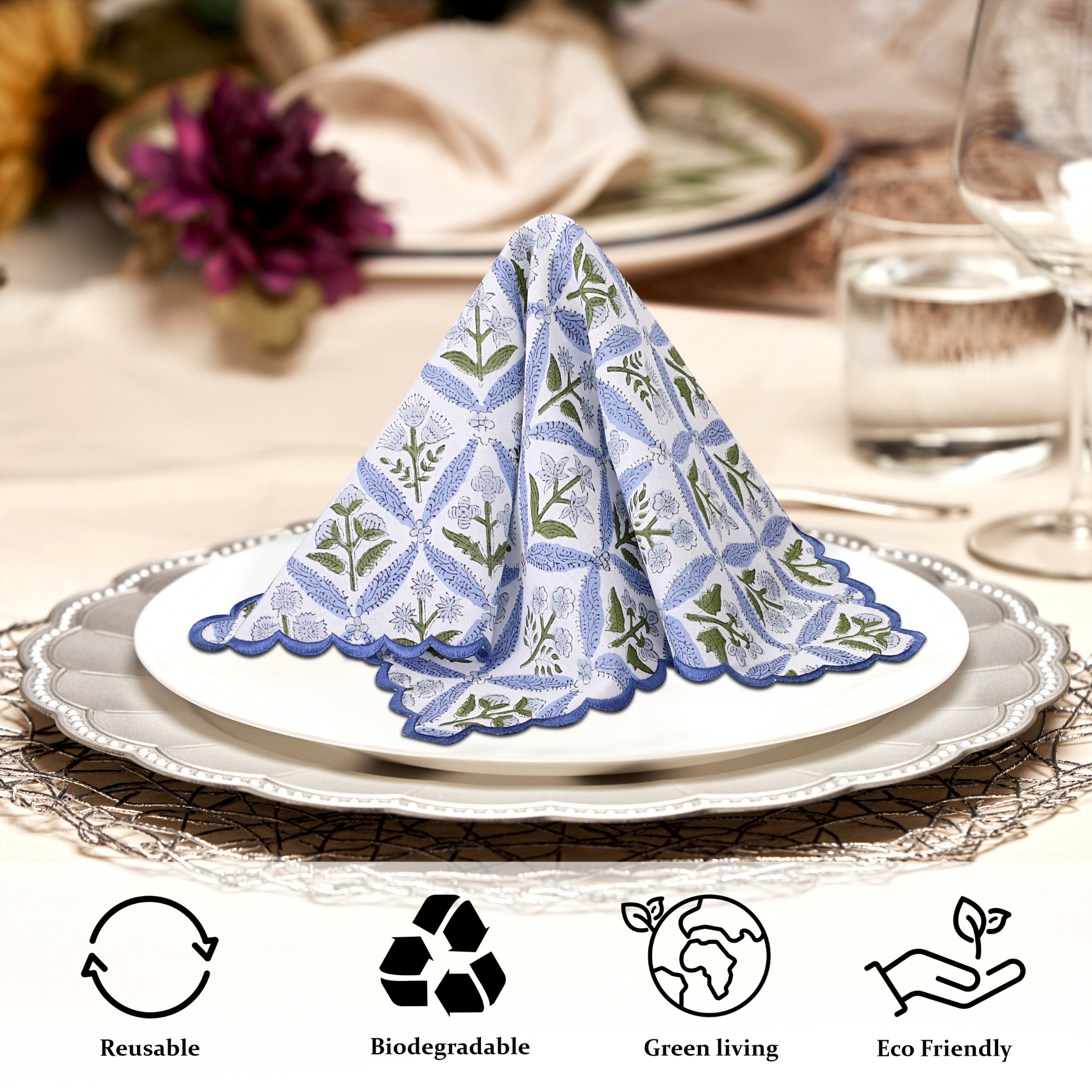 Decorative napkin on a plate with table setting and eco-friendly icons.