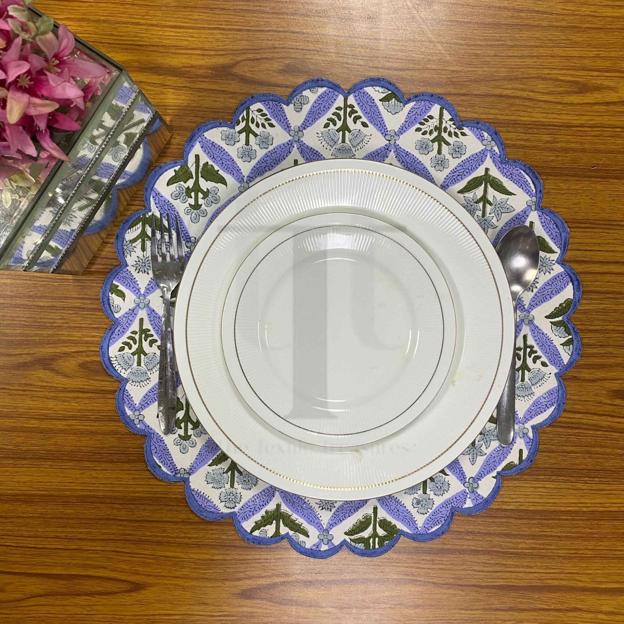 Decorative plate with floral pattern on a wooden table