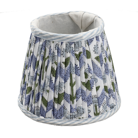 Floral patterned pet bed with a white border on a white background