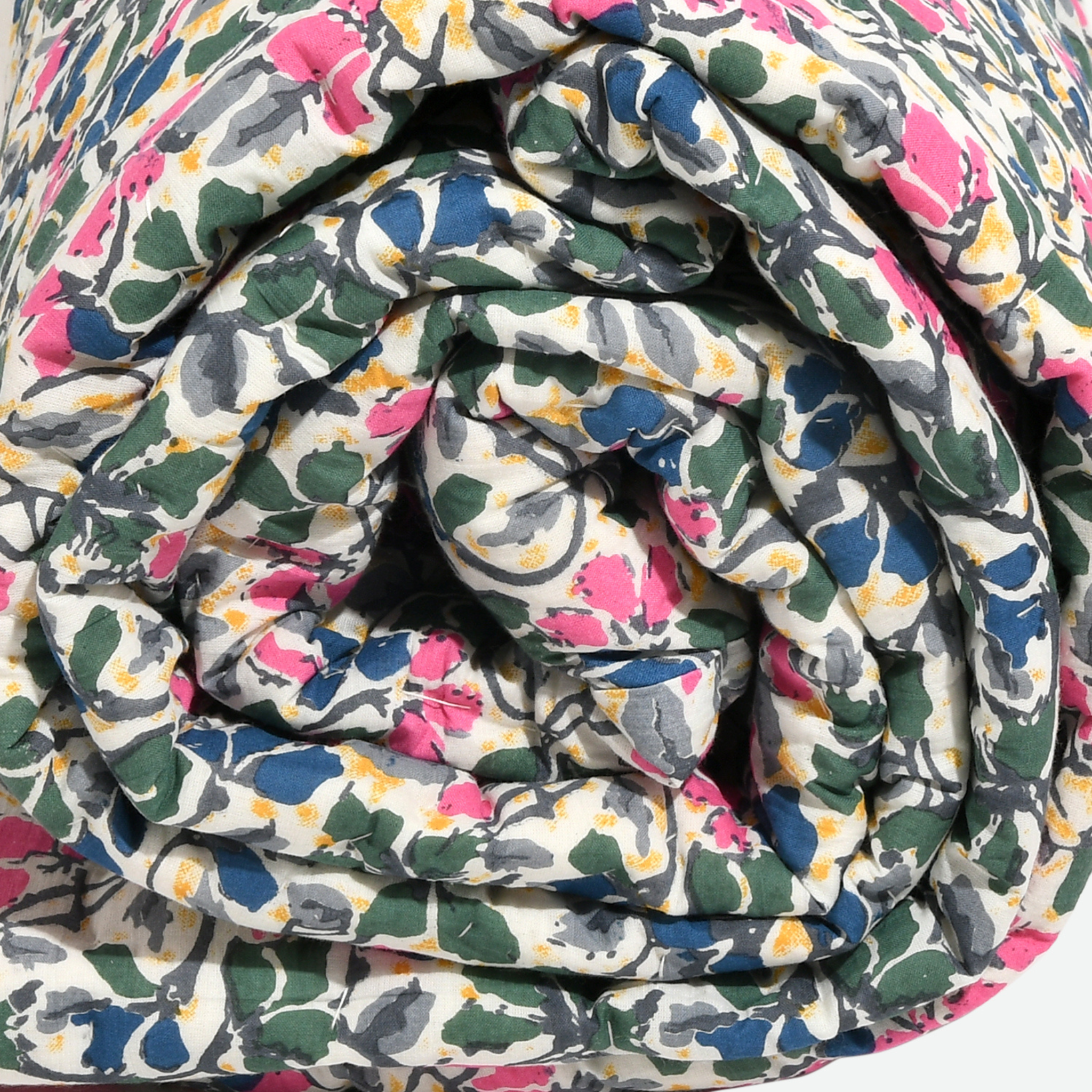 Rolled-up floral-patterned fabric with multicolor design