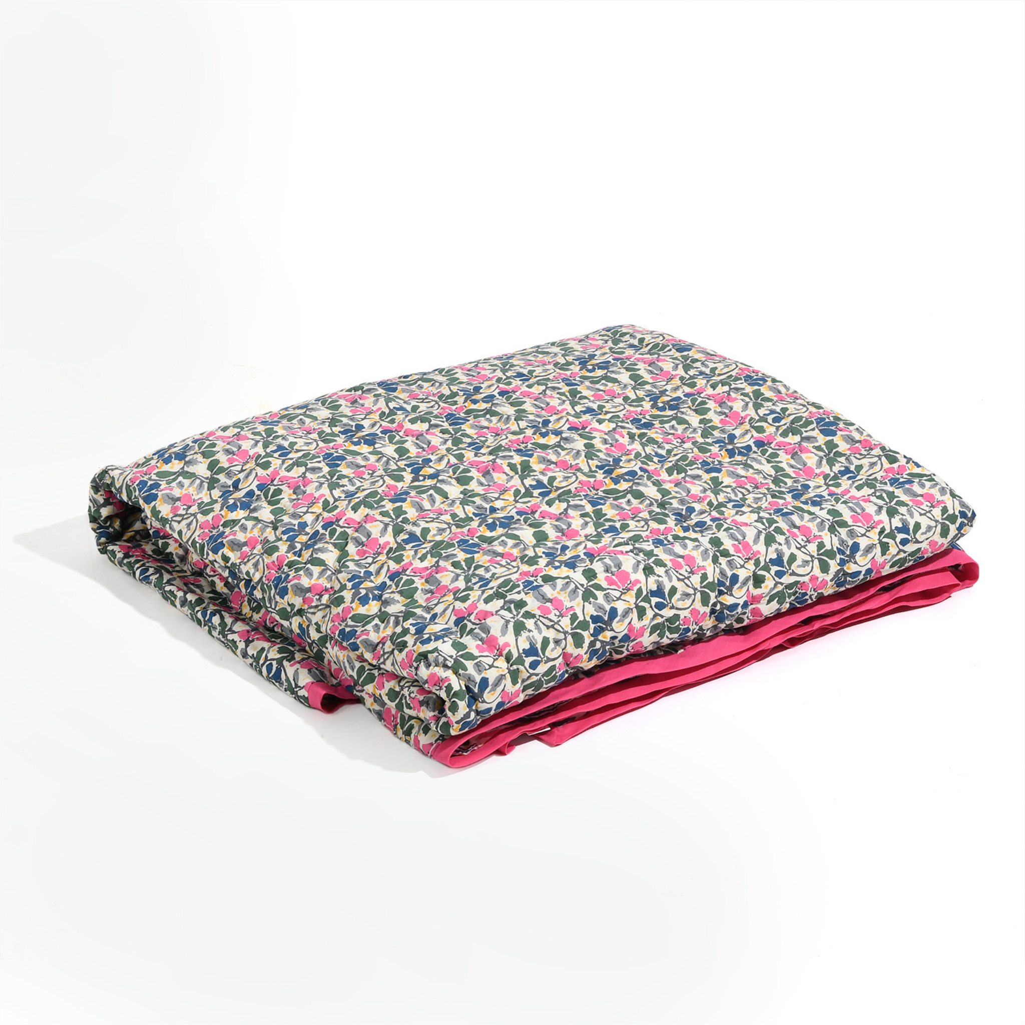 Floral patterned blanket with pink border on a white background
