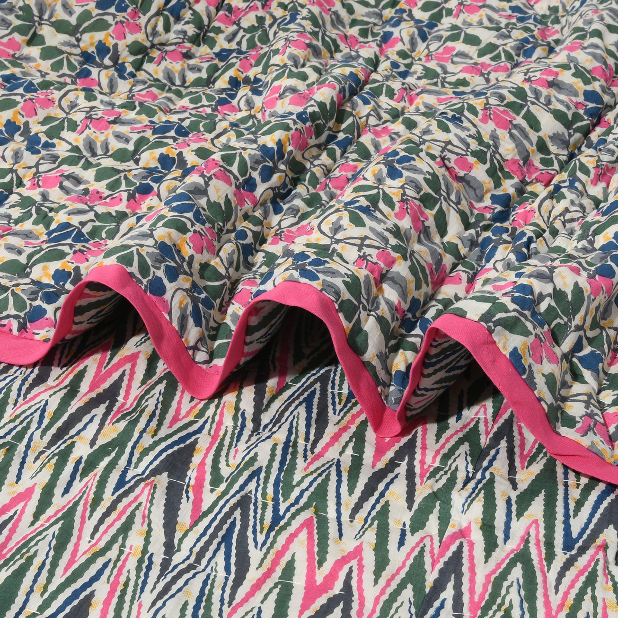 Floral and zigzag patterned fabric with pink trim