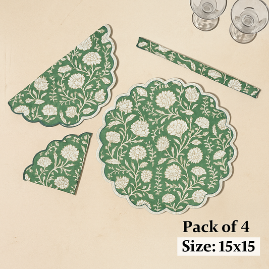 Set of green and white floral placemats on a beige background