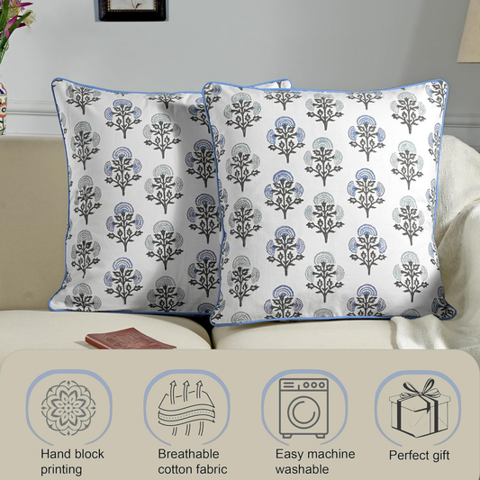 Two patterned pillows on a bed with product features listed below.