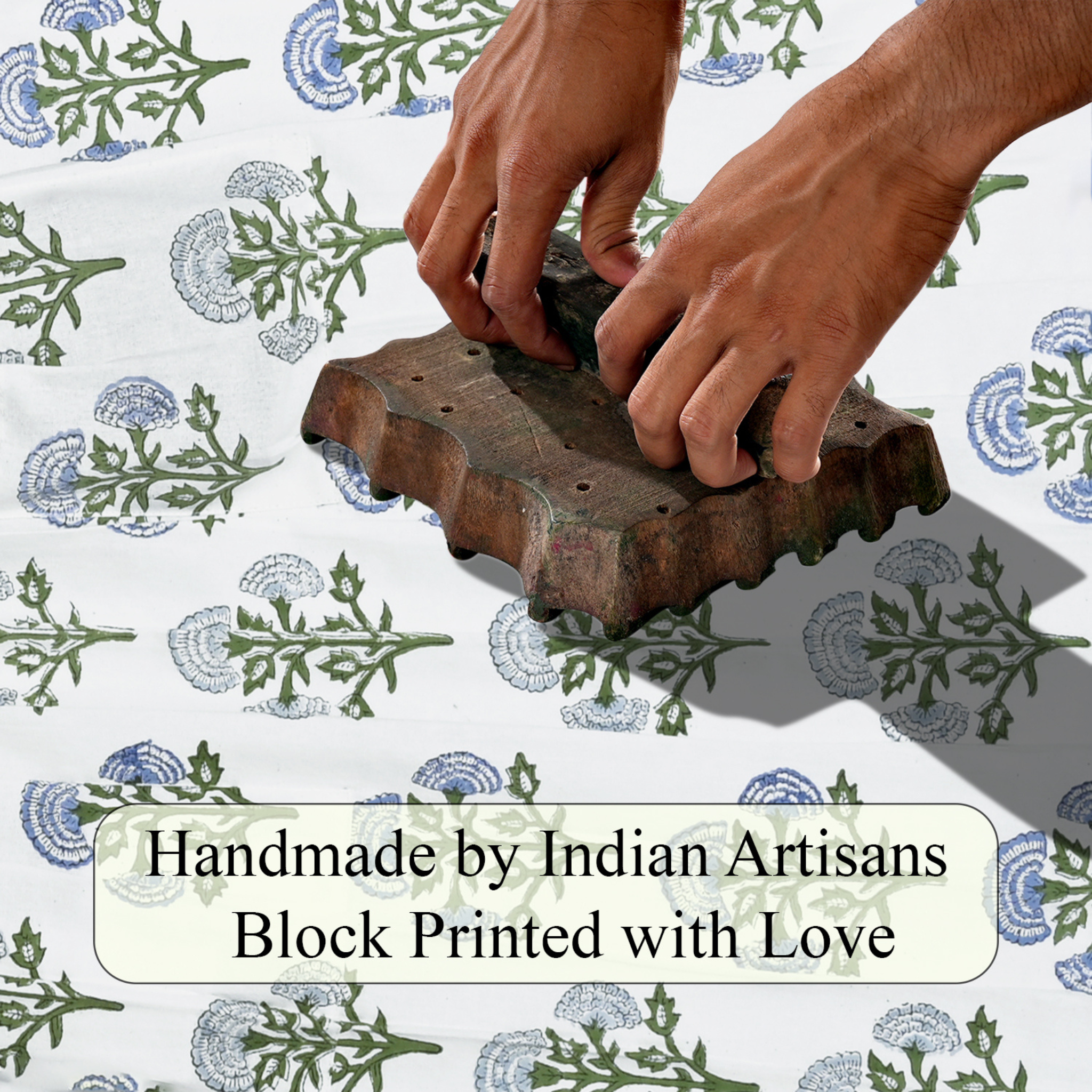 Hand block printing on fabric with text 'Handmade by Indian Artisans Block Printed with Love'.
