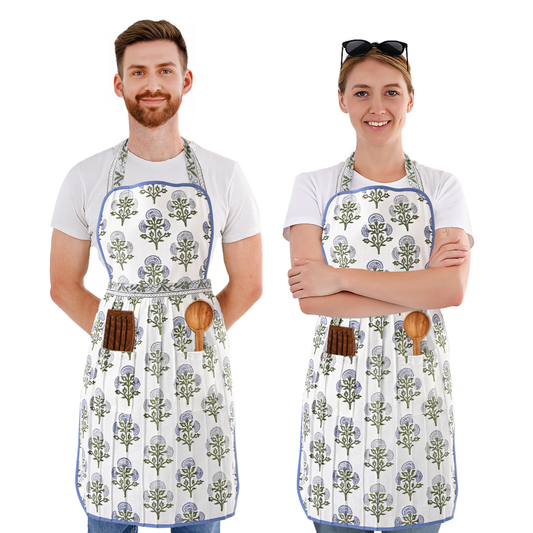 Two people wearing aprons with a floral pattern on a white background