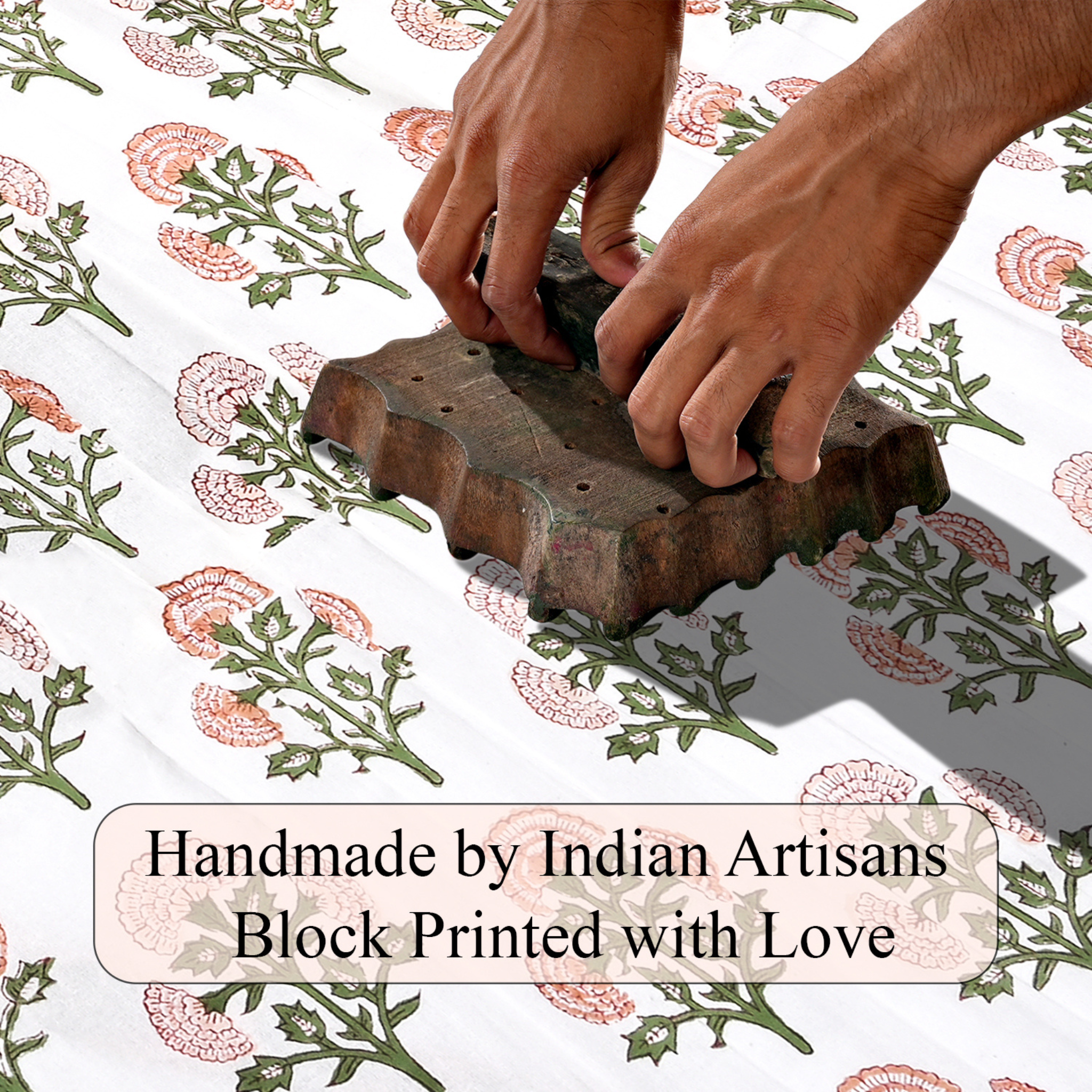 Hand block printing on fabric with text 'Handmade by Indian Artisans Block Printed with Love'.