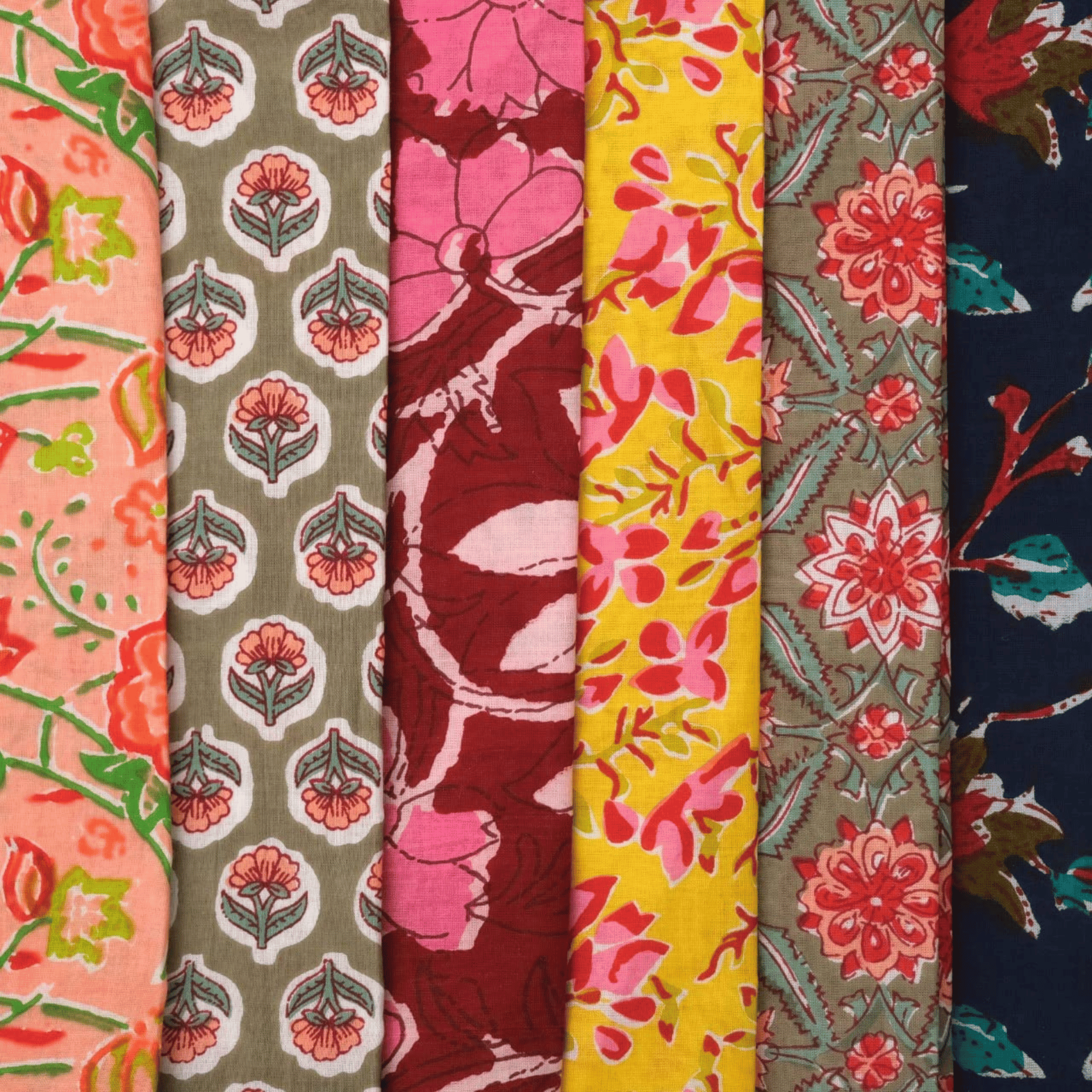 Collection of colorful fabric swatches with floral patterns