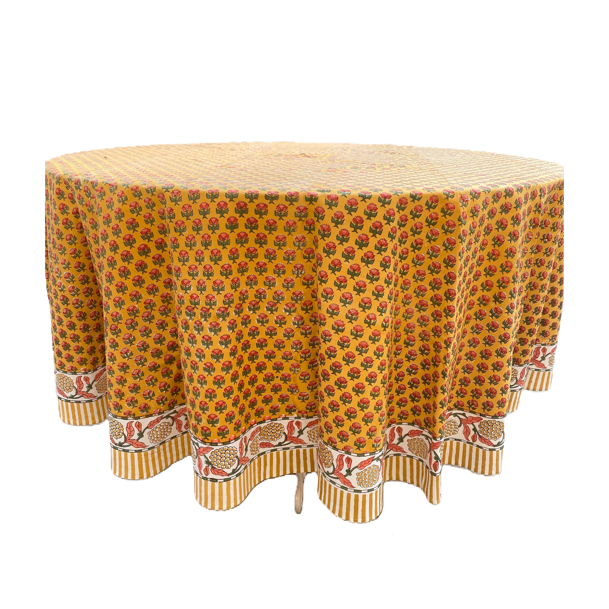 Round table with a patterned tablecloth on a white background