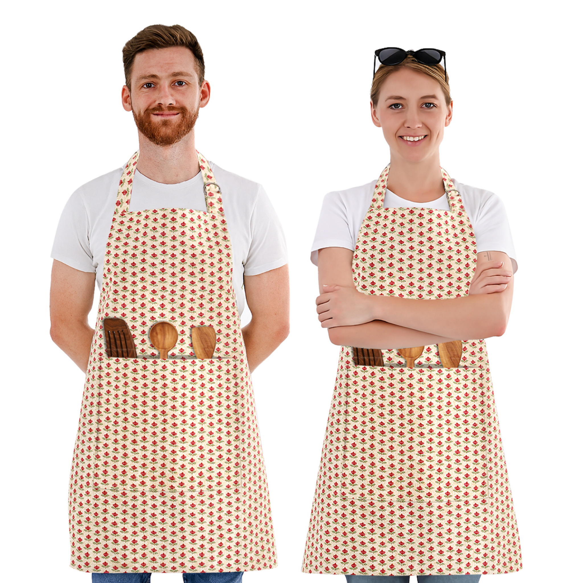 Two people wearing aprons with wooden spoon pockets on a white background