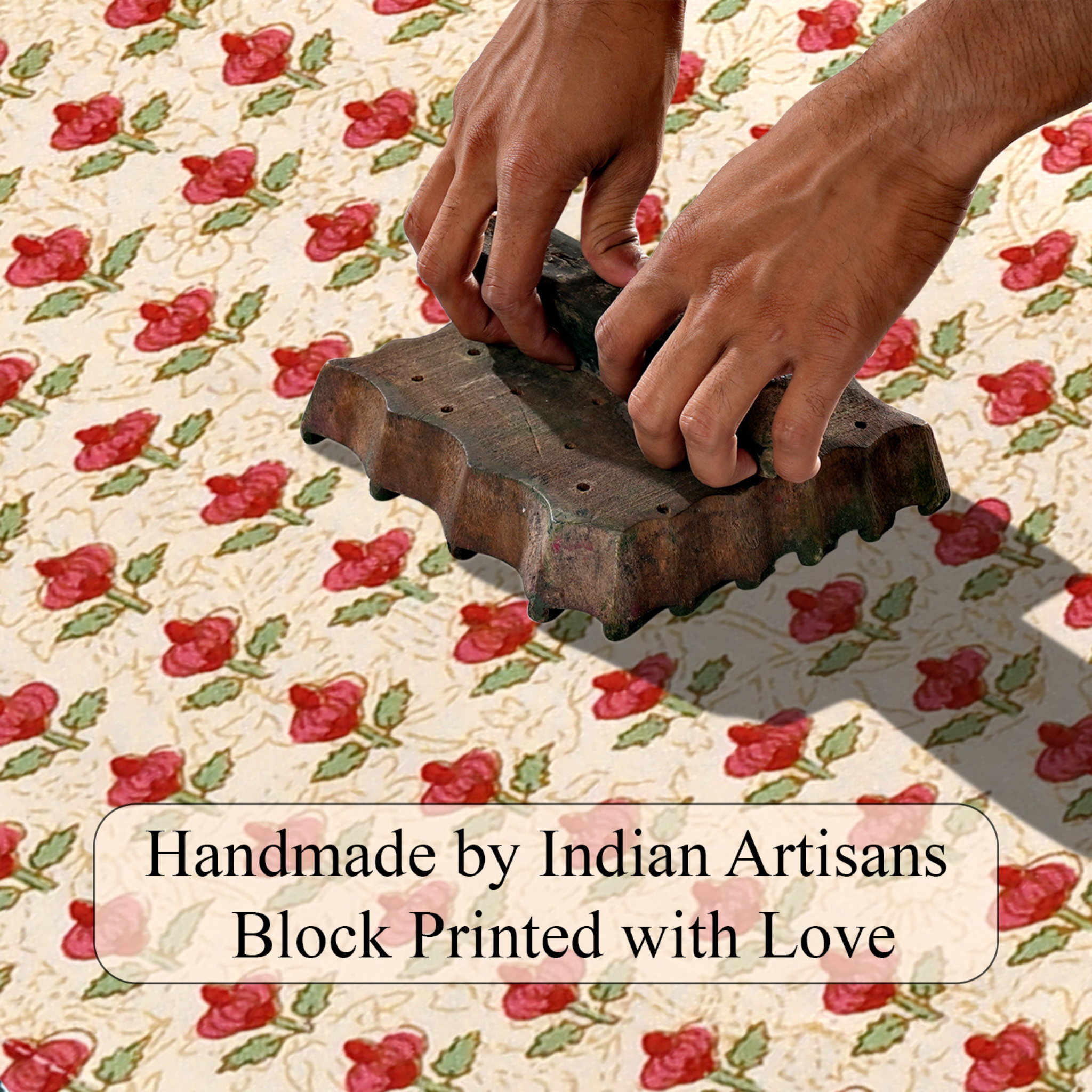 Hand block printing on fabric with text 'Handmade by Indian Artisans Block Printed with Love'.