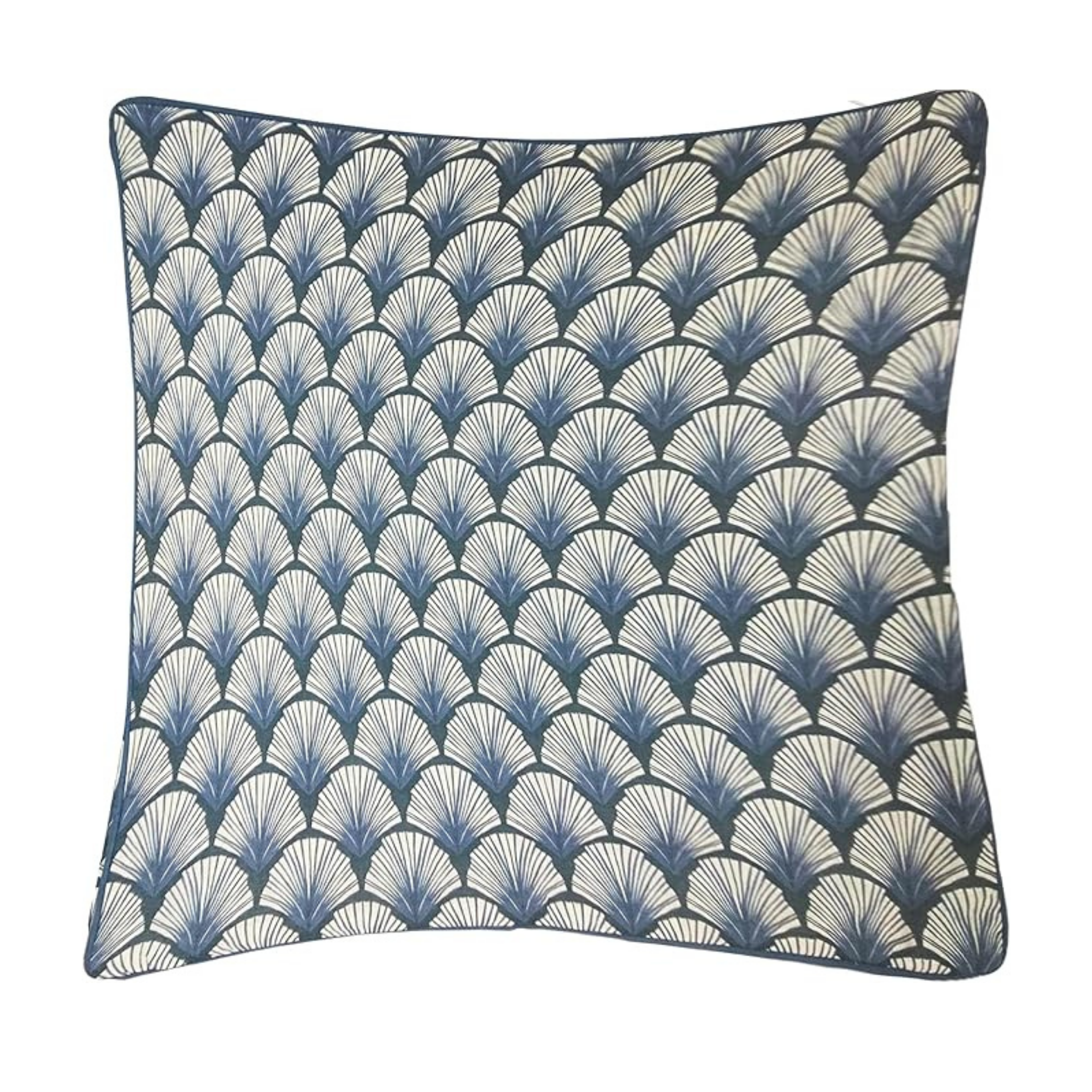 Decorative pillow with blue and white shell pattern on a white background