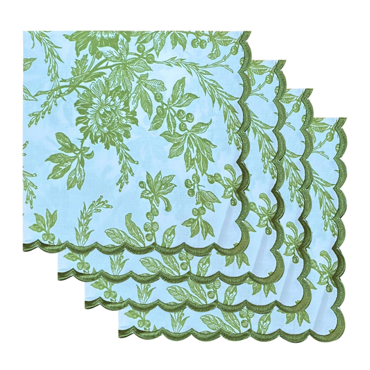 Set of three green floral-patterned napkins on a white background