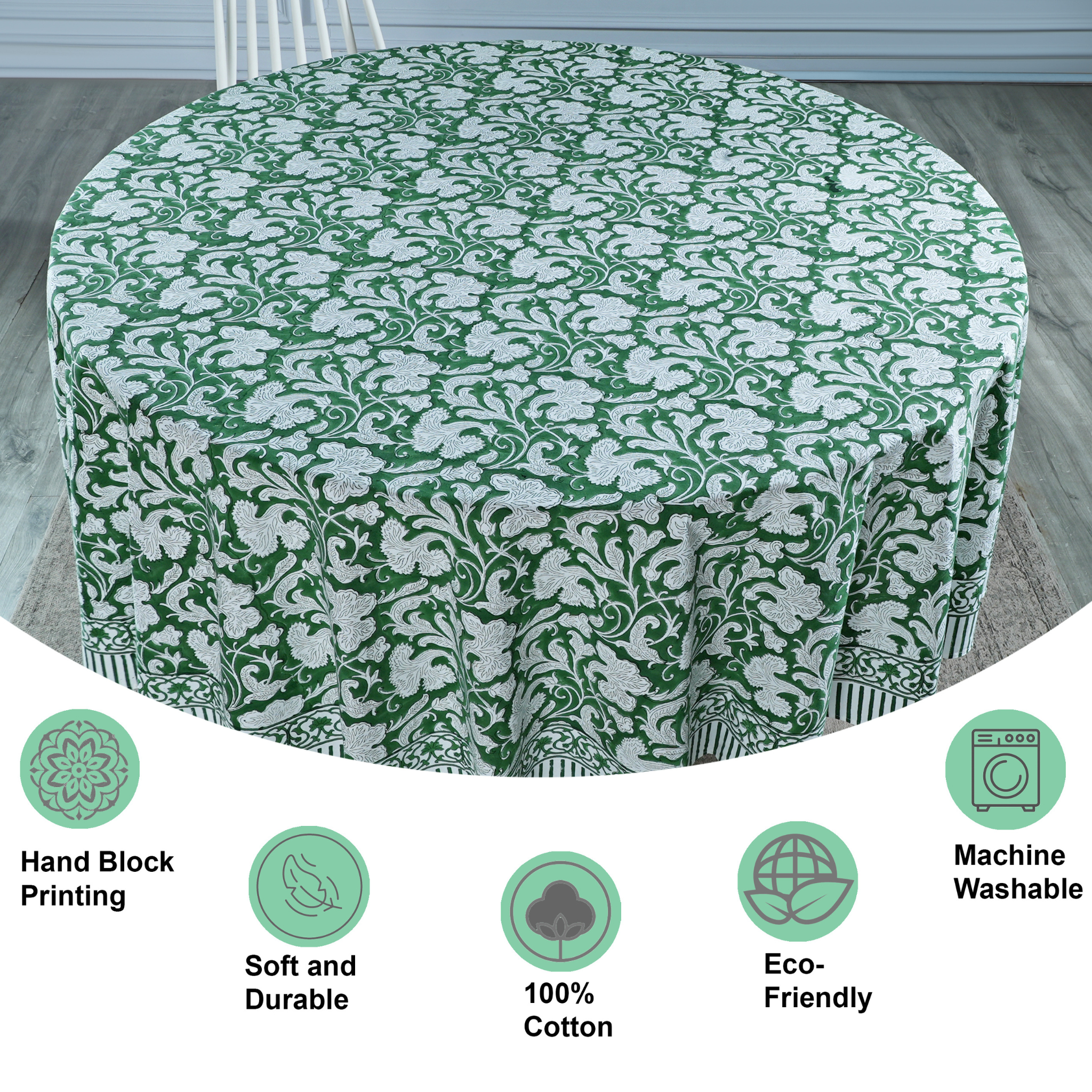 Green and white patterned tablecloth on a round table with product features displayed below.