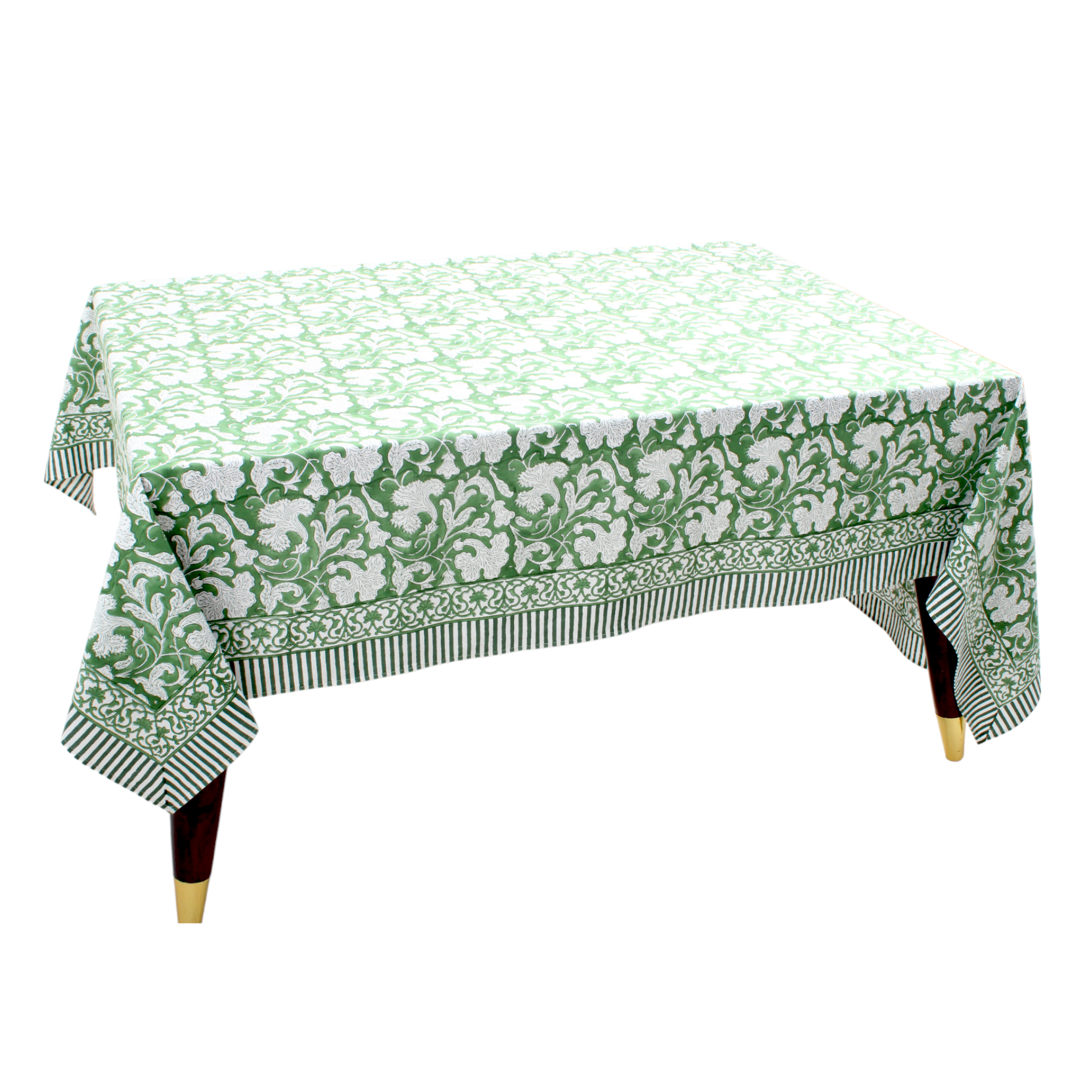 Green and white patterned tablecloth on a table with a white background