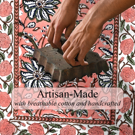 Hands working with a wooden tool on a floral patterned background, featuring text about breathable cotton and handcrafted items.