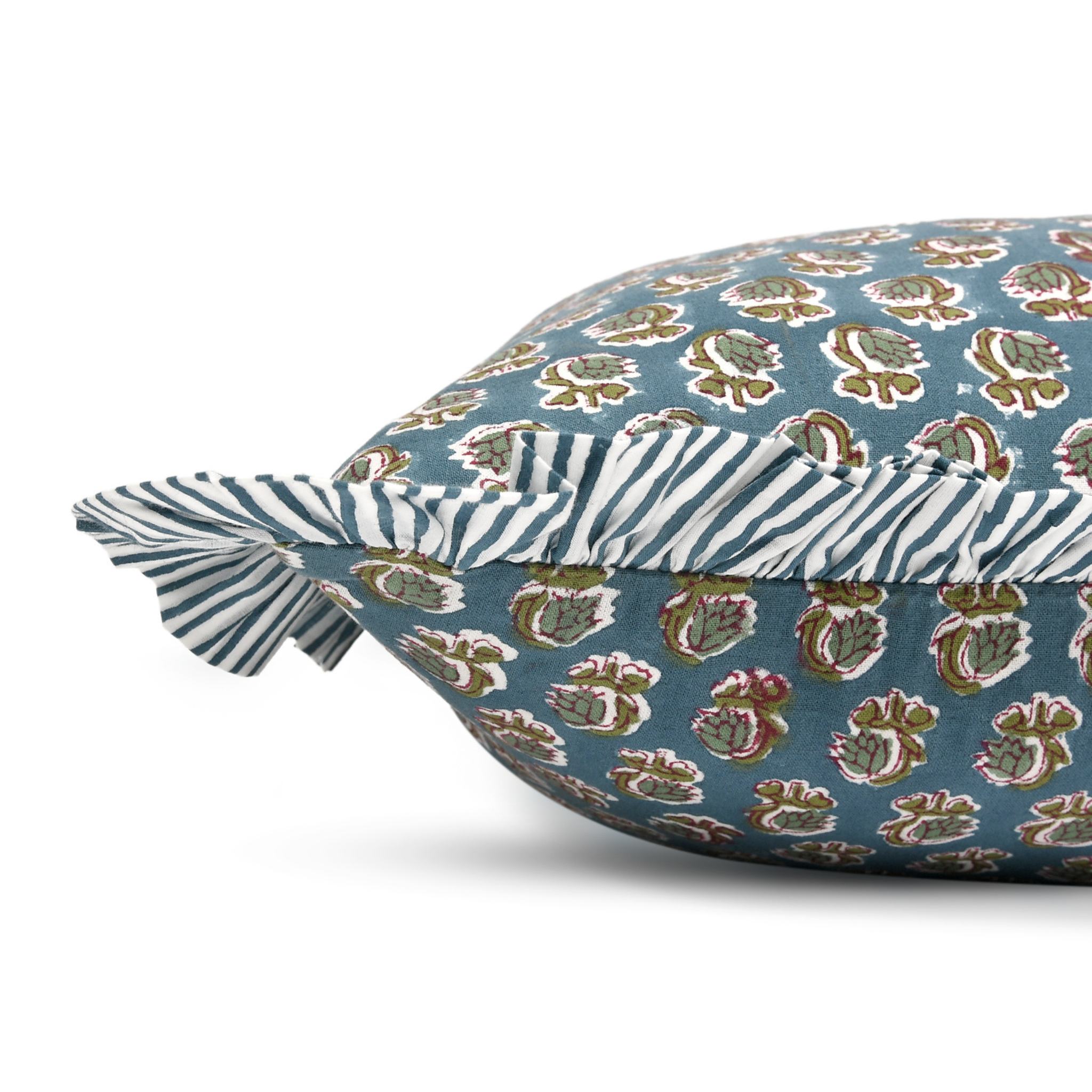 Decorative pillow with a floral pattern on a blue background