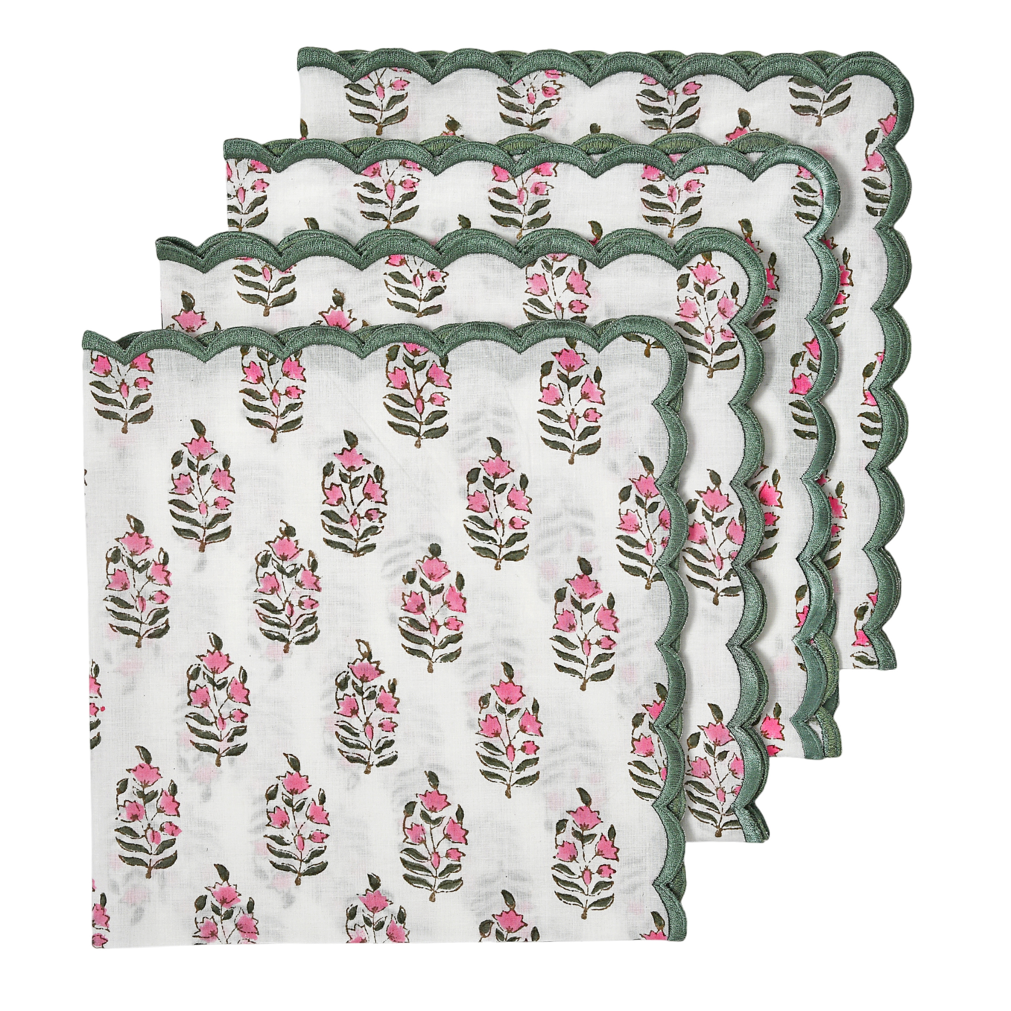 Set of three floral placemats with green scalloped edges on a white background