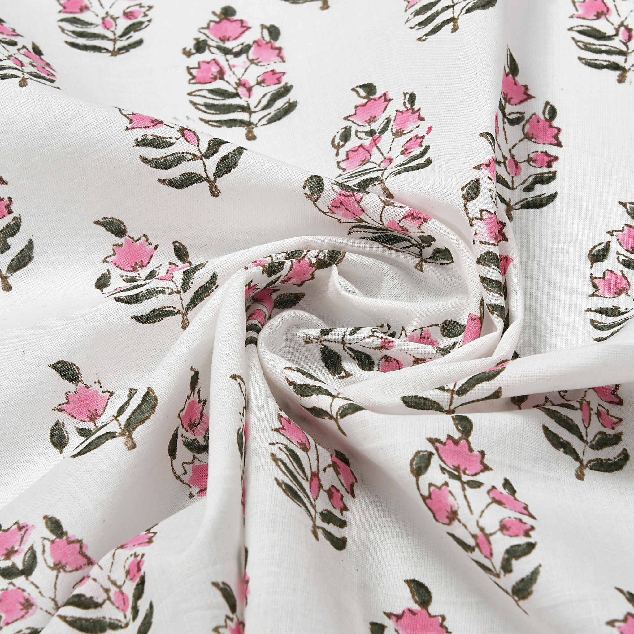 Floral patterned fabric with pink flowers and green leaves on a white background