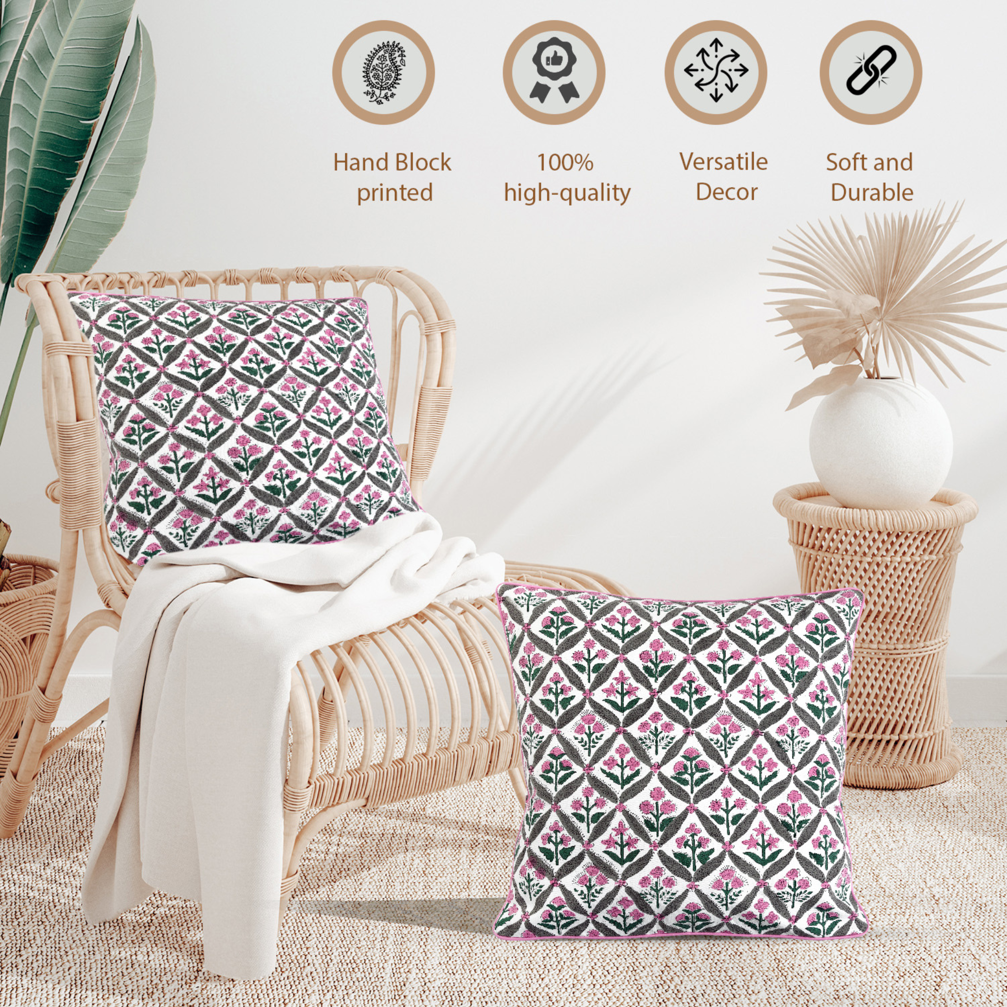 Decorative pillows with a geometric pattern on a wicker chair, surrounded by plants and decor items.