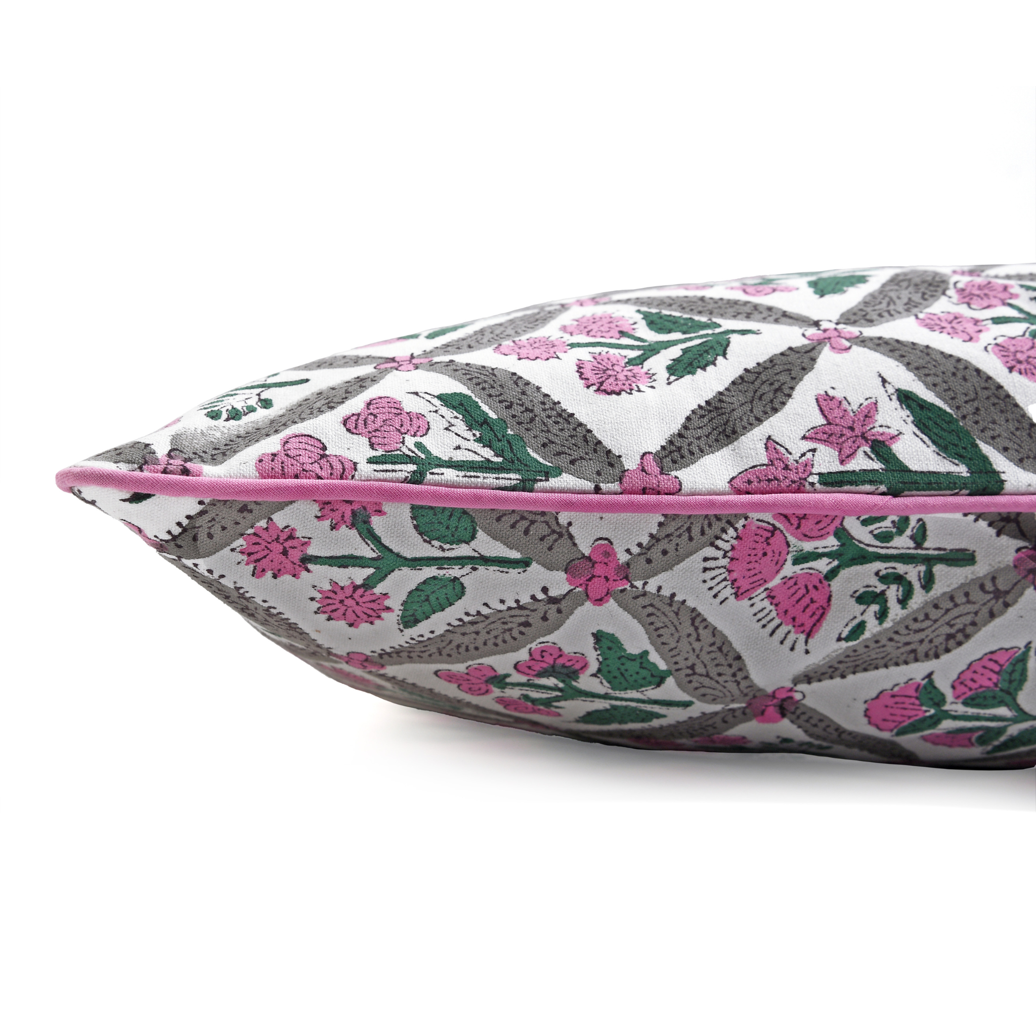 Decorative pillow with floral pattern on a white background