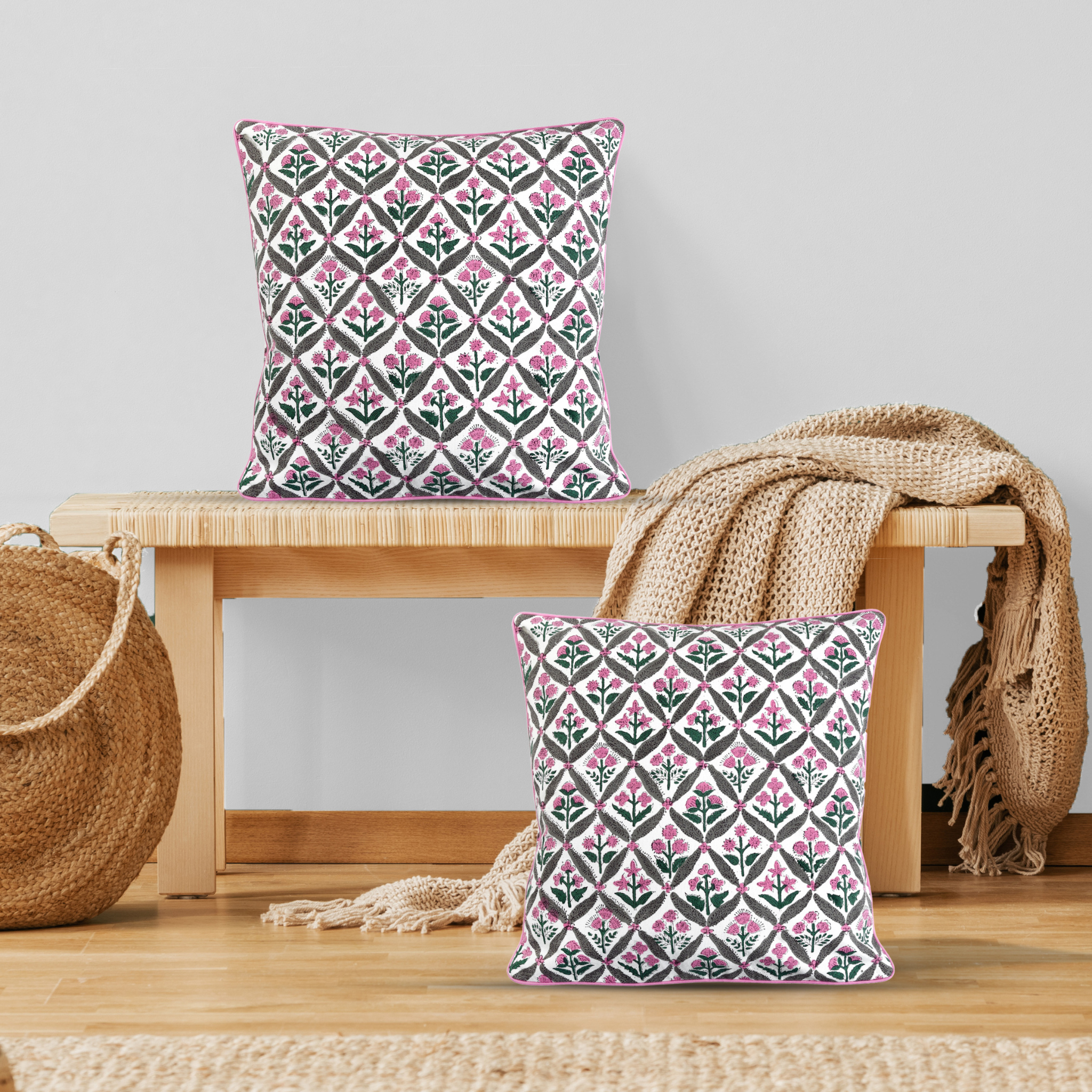 Patterned cushions on a wooden bench with a neutral background
