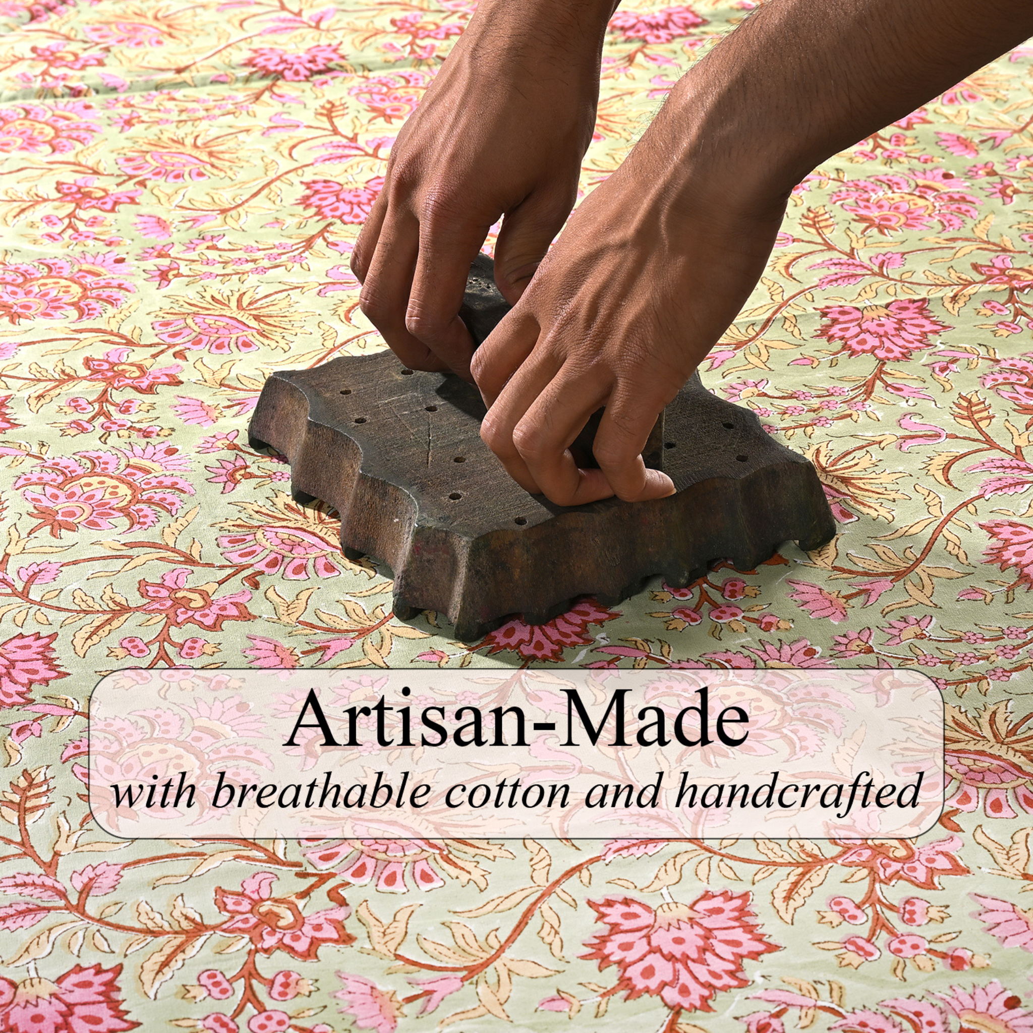 Hands using a wooden tool on floral fabric with 'Artisan-Made' text overlay.