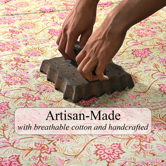 Hands using a wooden tool on floral fabric with 'Artisan-Made' text overlay.
