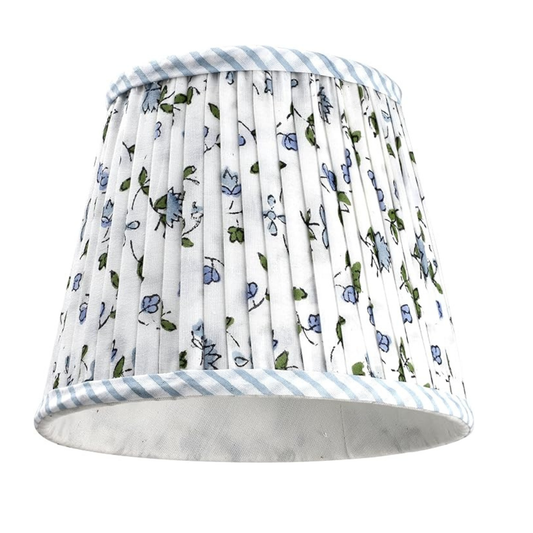 Floral patterned lampshade with blue stripes on a white background