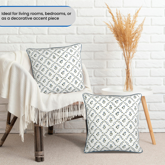 Decorative pillows on a chair with a white brick wall background