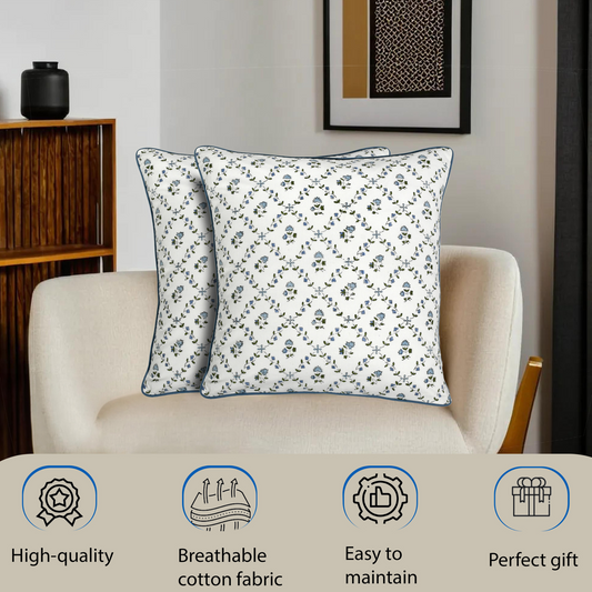 Two floral-patterned pillows on a beige armchair with product features displayed below.