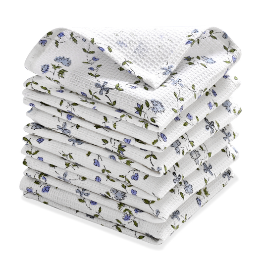 Stack of floral-patterned towels on a white background