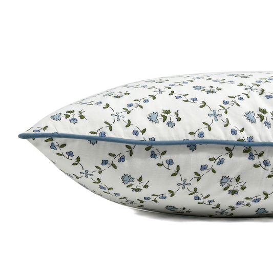 Floral-patterned pillow on a white background