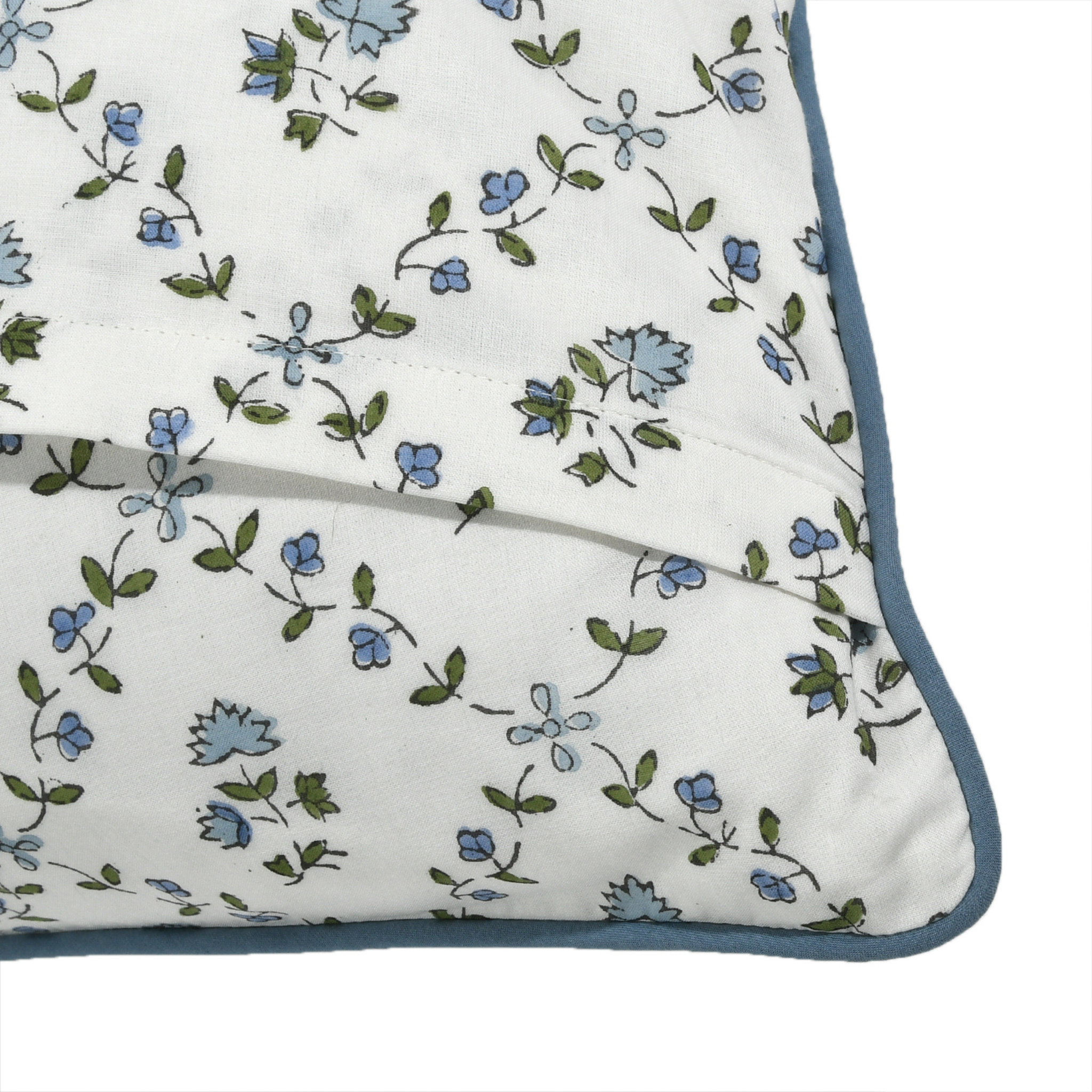 Floral-patterned fabric with blue and green flowers on a white background