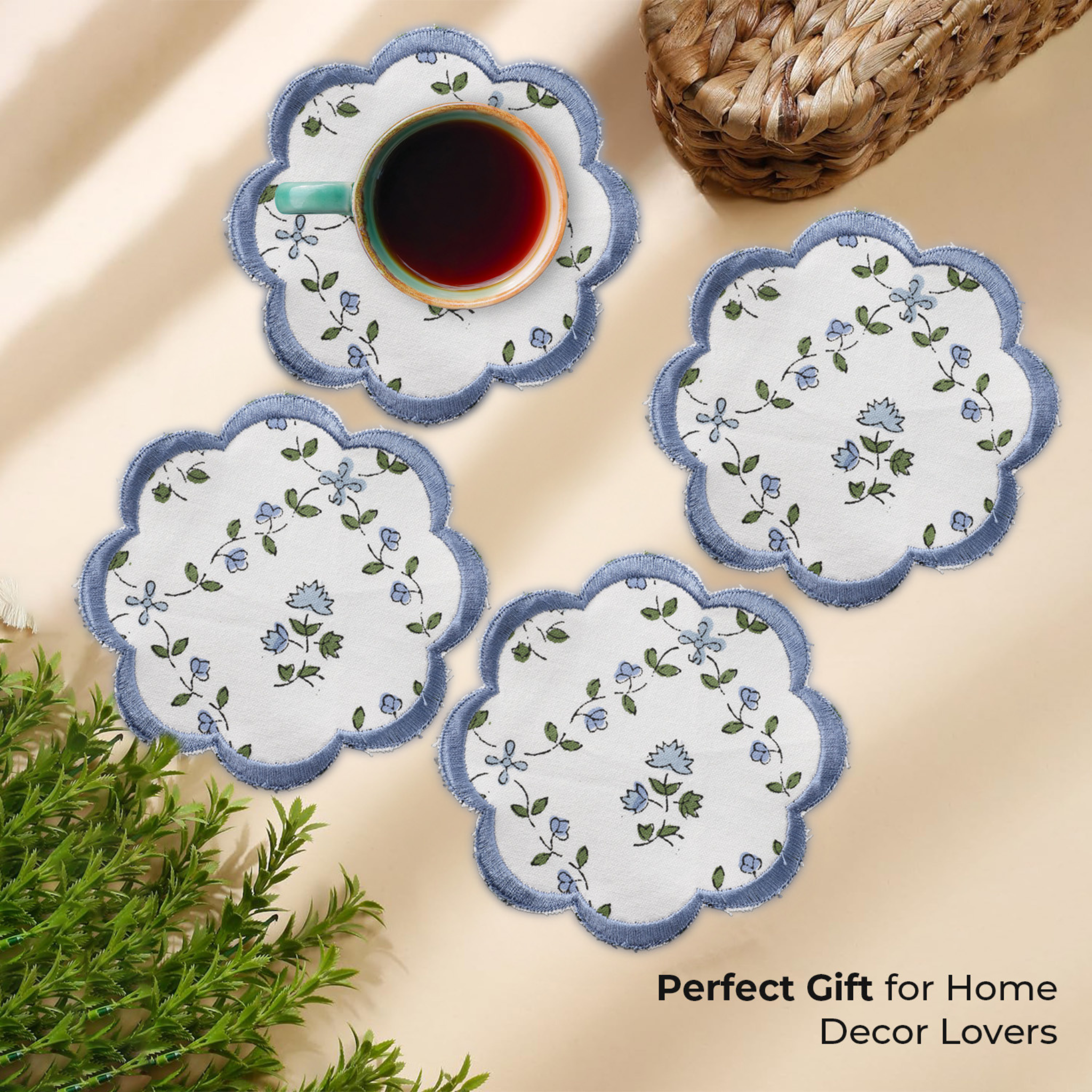 Set of floral coasters with a cup of coffee on a beige surface, accompanied by text 'Perfect Gift for Home Decor Lovers'.
