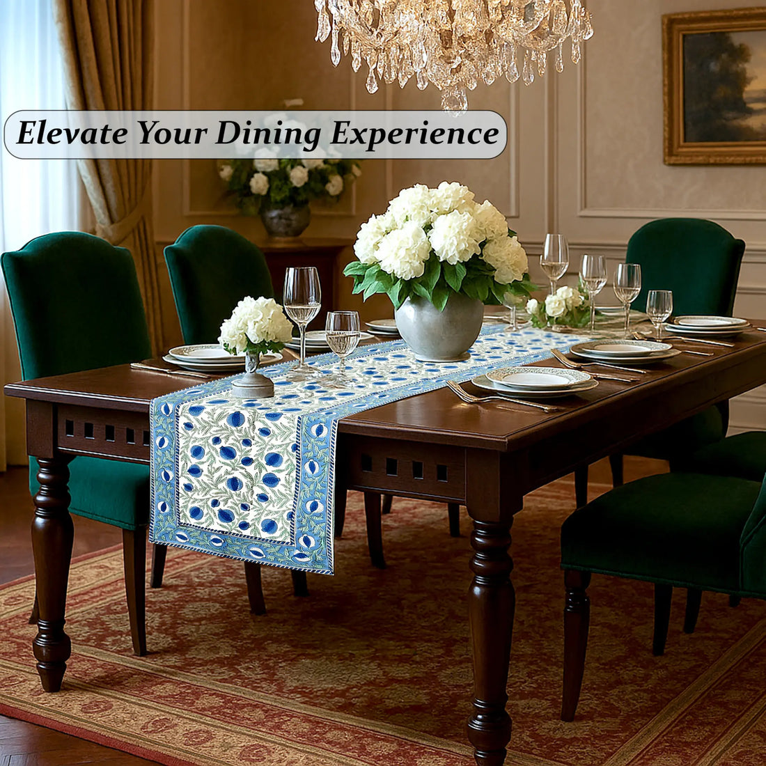 Dining room with a table set for dinner, flowers, and a chandelier.