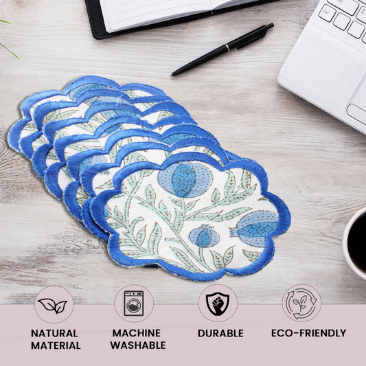 Set of floral-patterned pads on a desk with office supplies and product features highlighted.