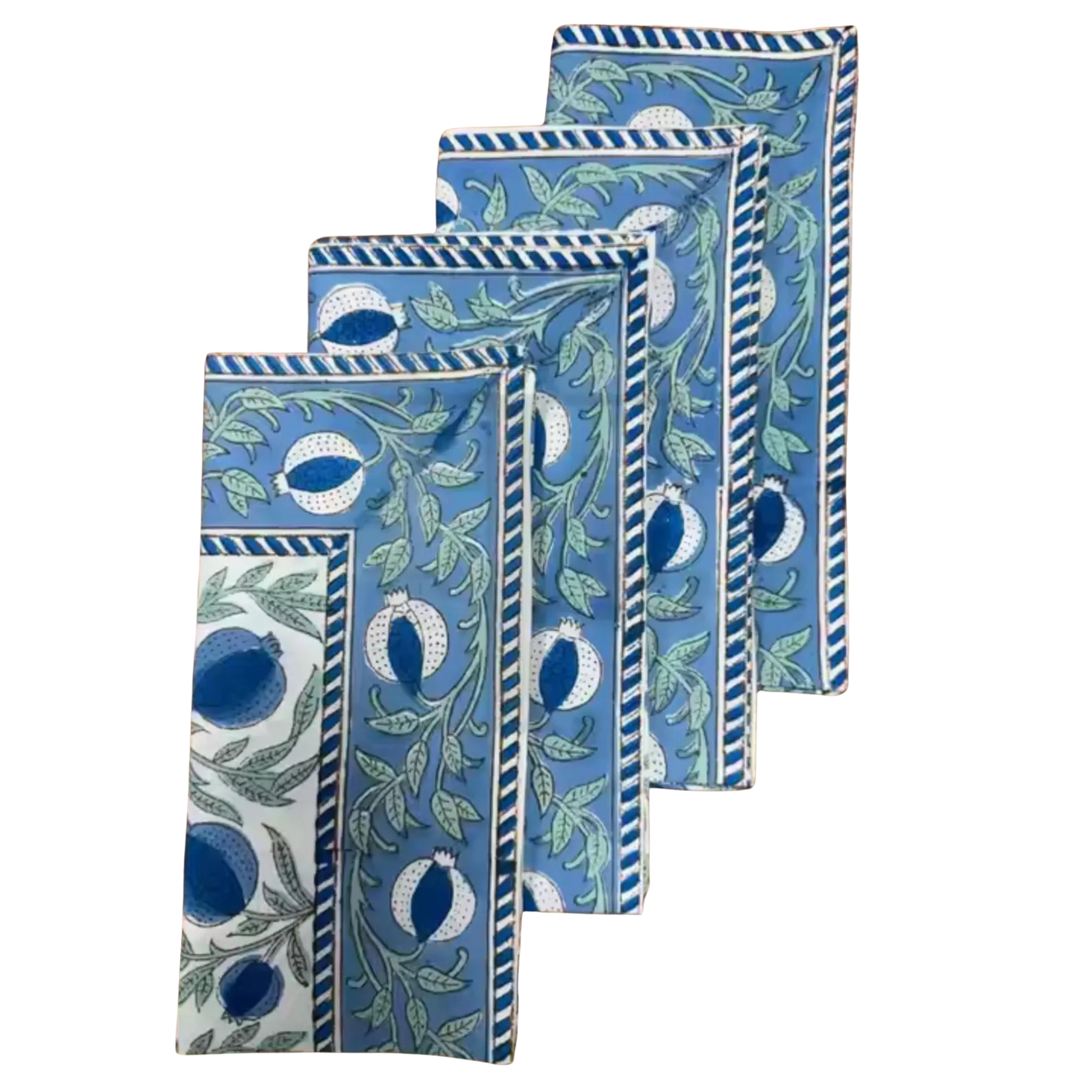 Set of four blue patterned napkins on a white background