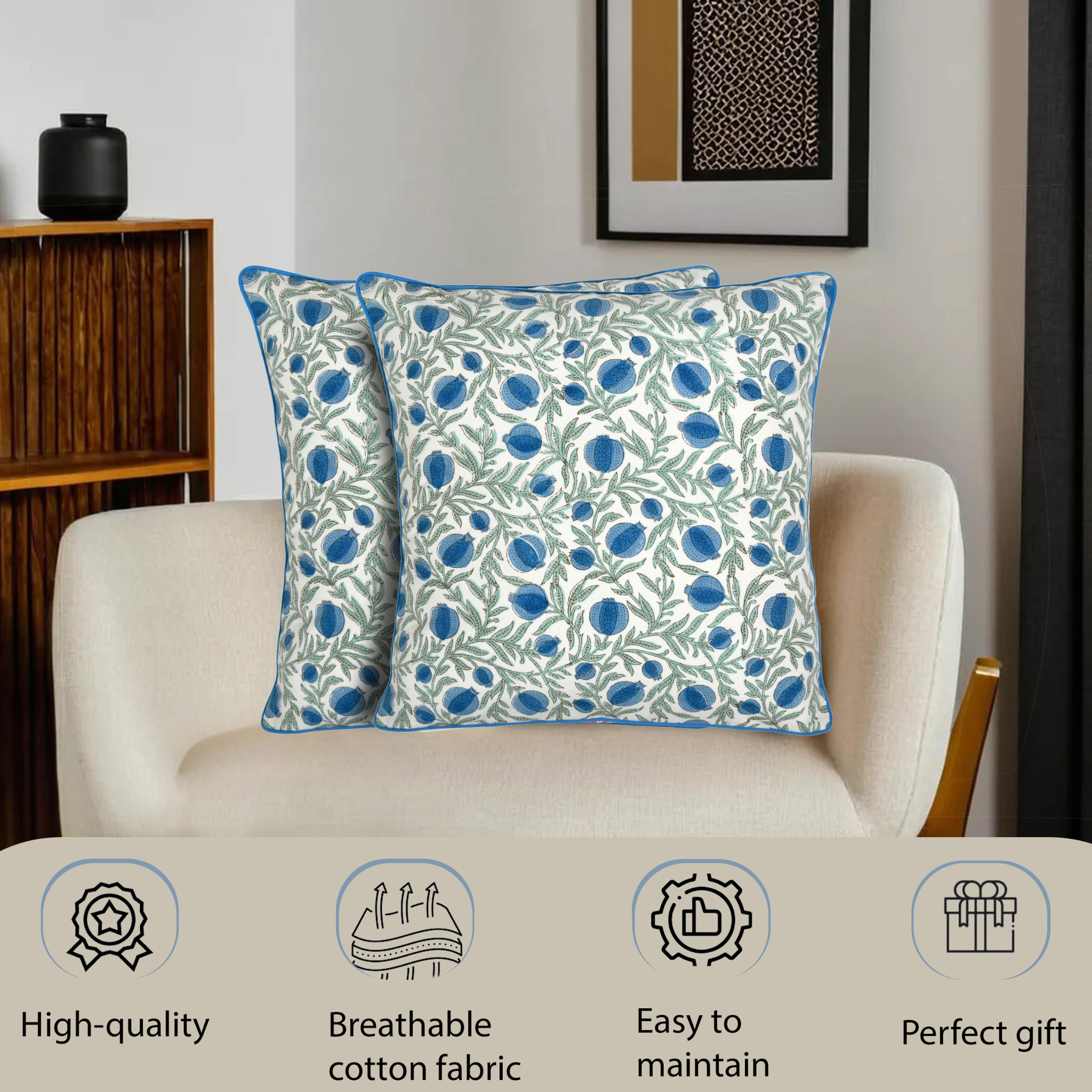 Two decorative pillows with blue floral pattern on a beige armchair, with product features displayed below.