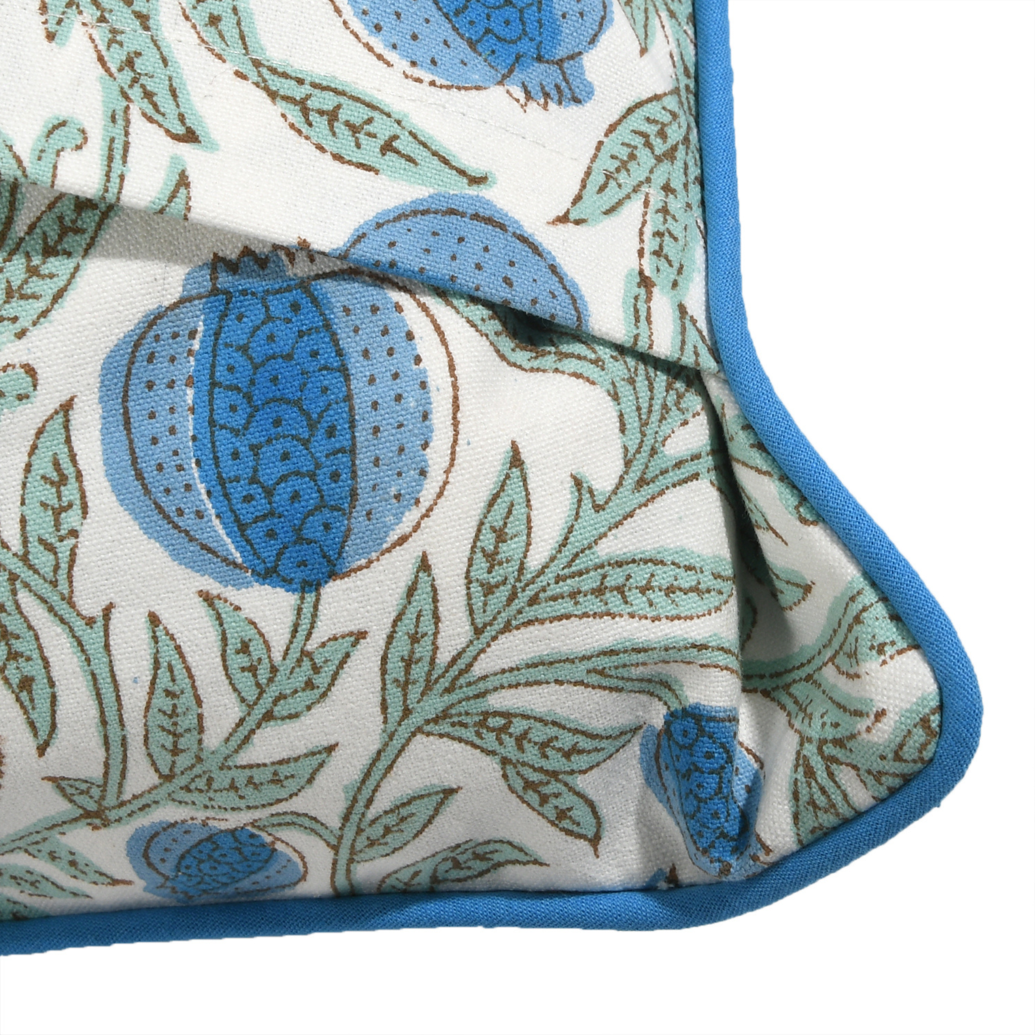 Fabric with blue and green floral pattern on a white background
