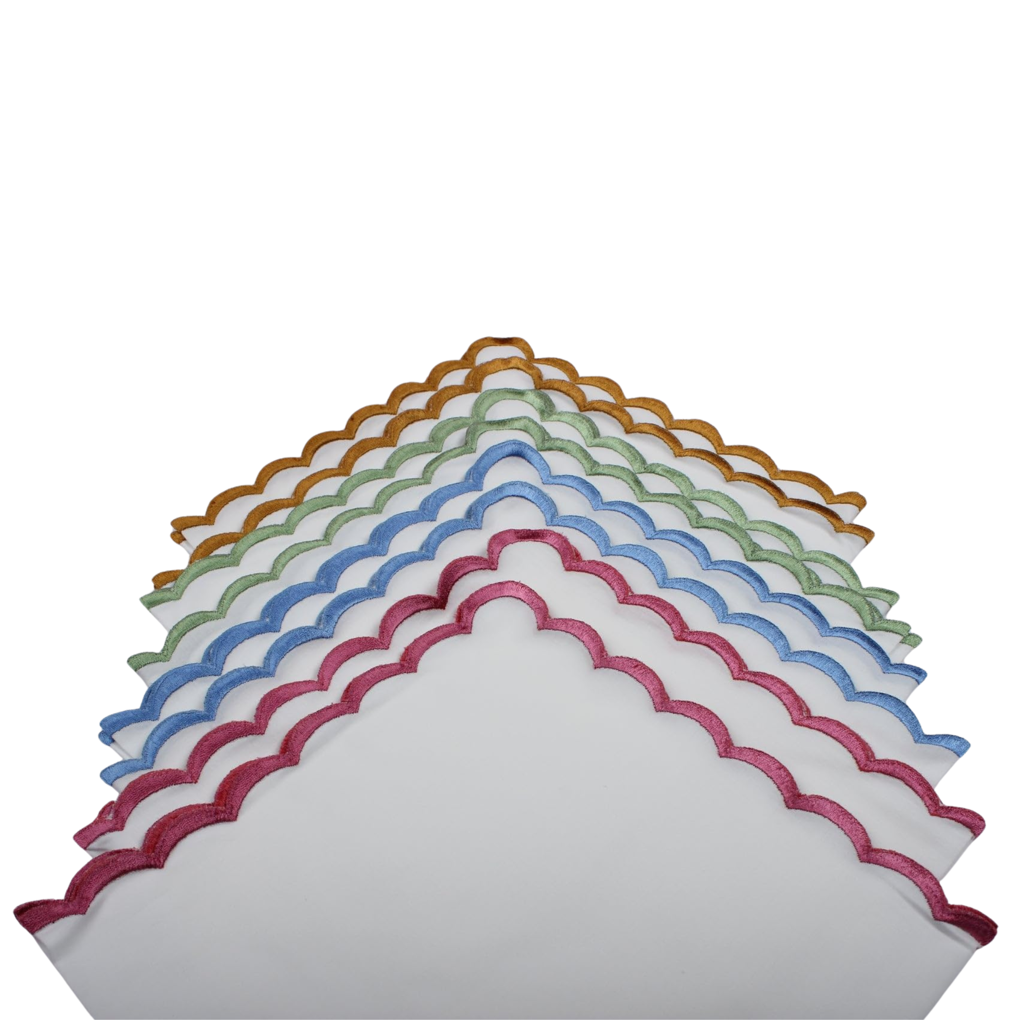 Set of colorful scalloped edge napkins on a white background