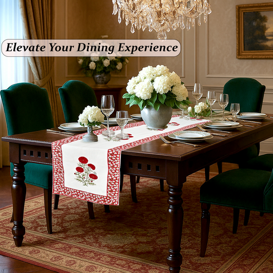 Dining room with a table set for a meal, flowers, and a chandelier.