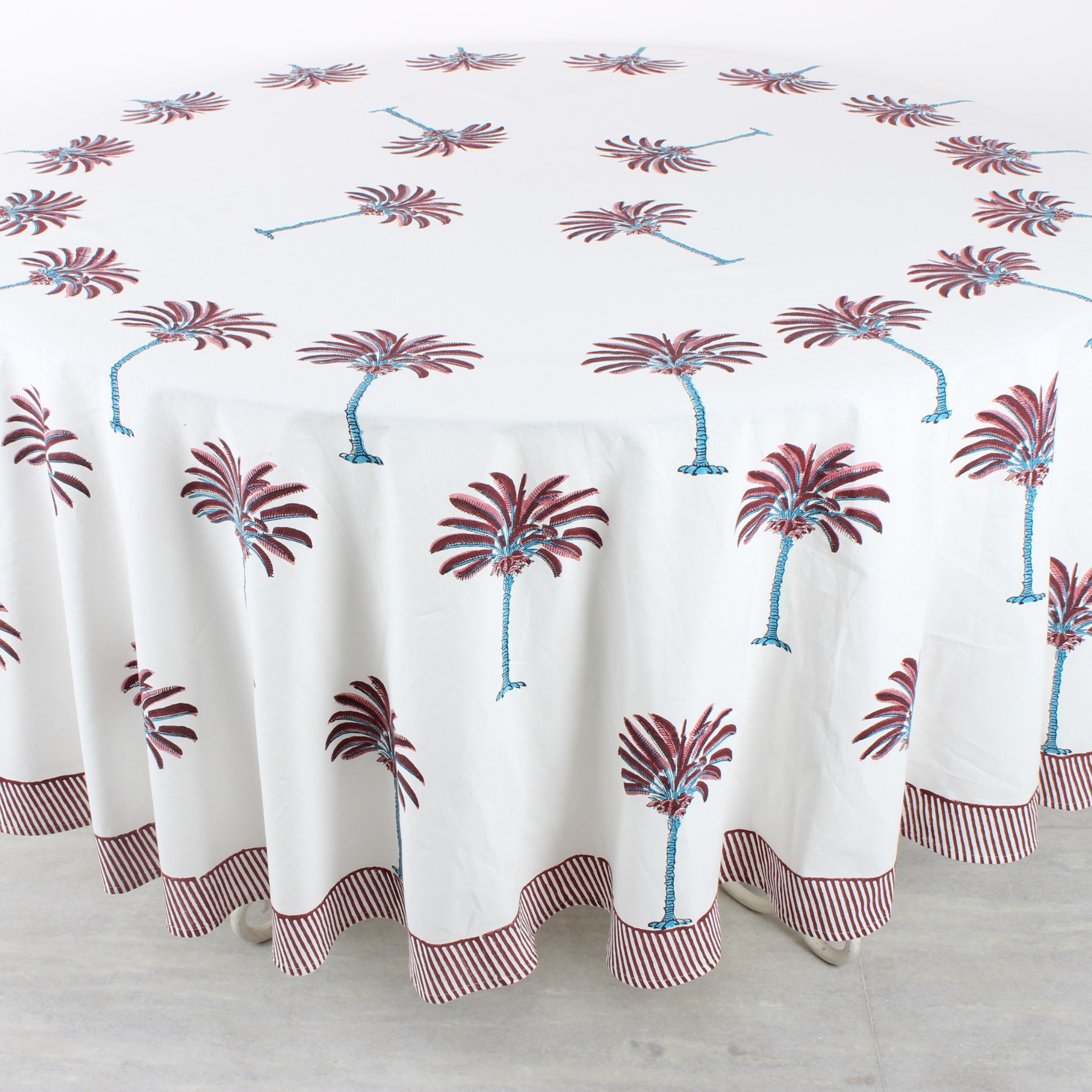 Tablecloth with palm tree design on a white background