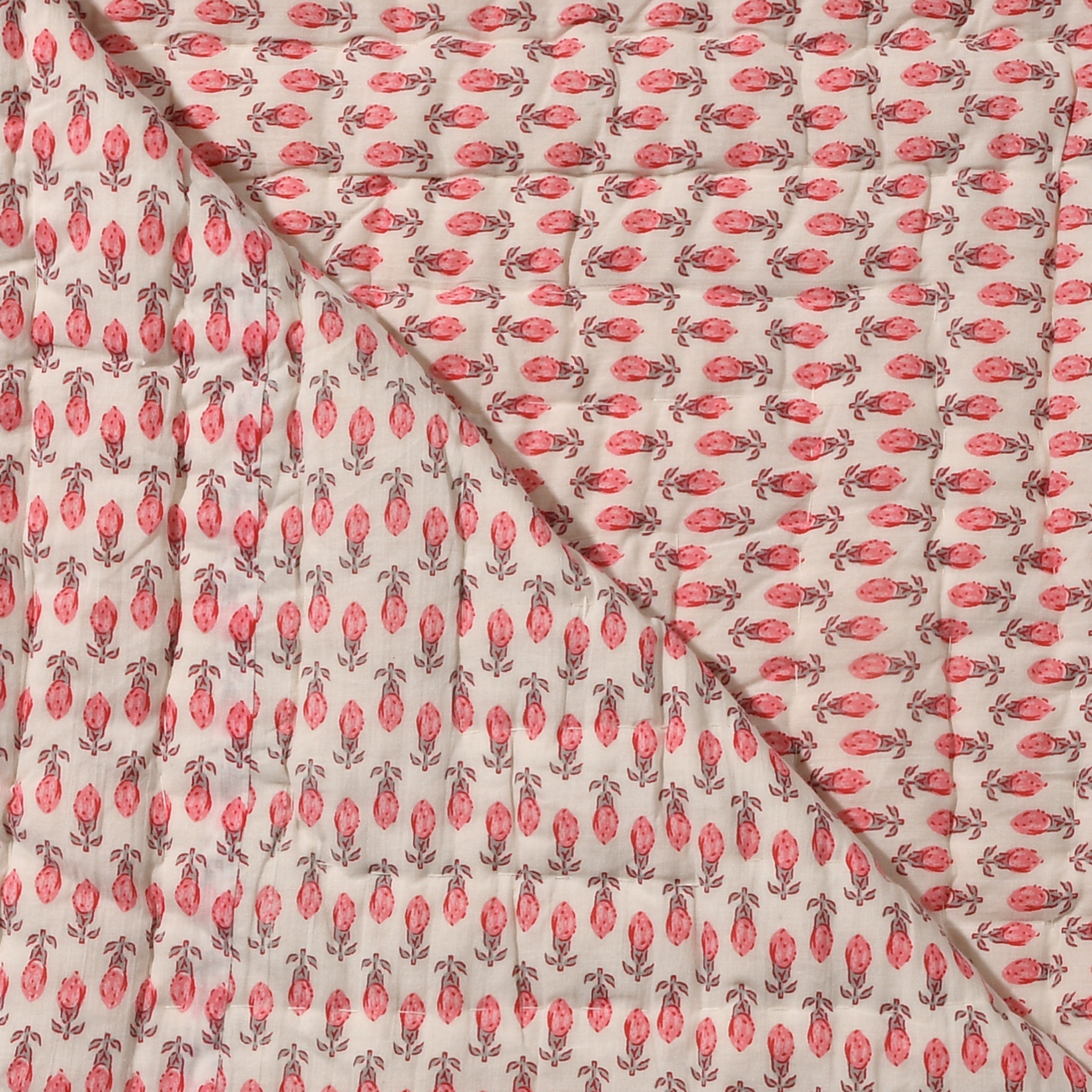 Fabric with pink floral pattern on a beige background