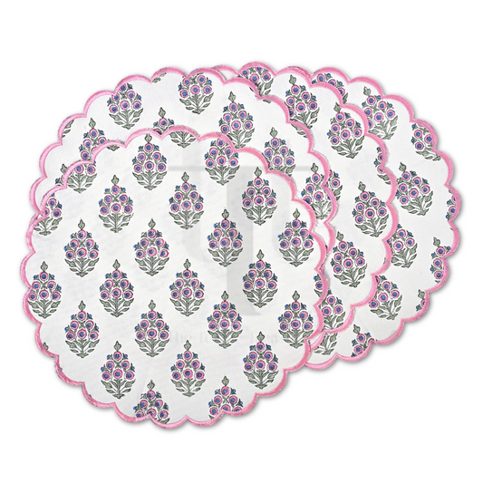 Set of round placemats with floral pattern on a white background