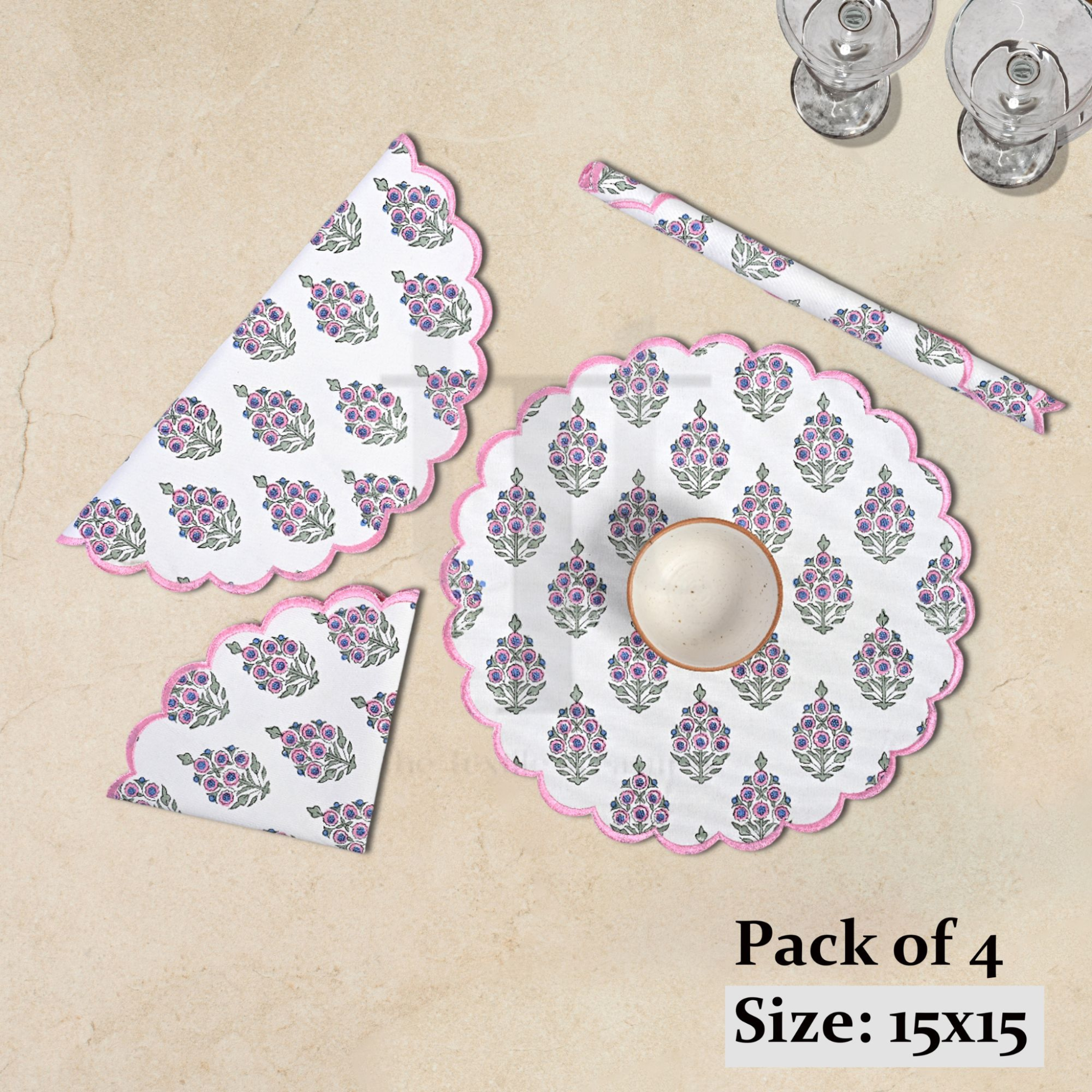 Set of floral table mats and coasters on a beige surface with text indicating 'Pack of 4' and size '15x15'.